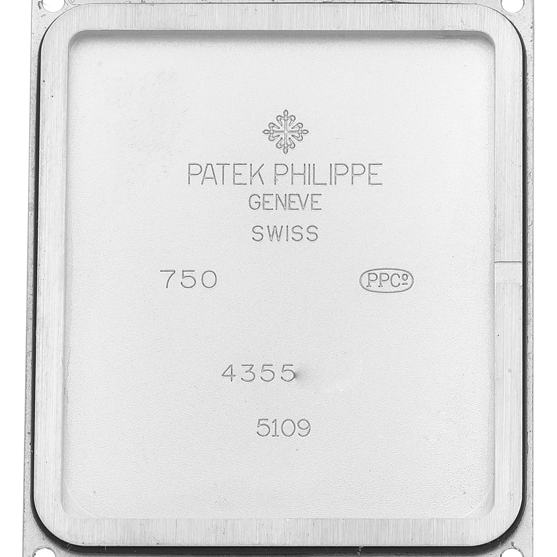 The image shows the inner back case of a Patek Philippe Gondolo 5109G Men's White Gold Silver Dial 5109G Men's White Gold Silver Dial watch, featuring brand inscriptions and serial numbers.
