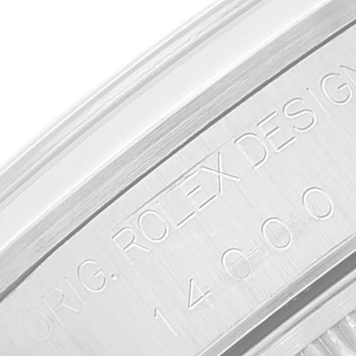 The image shows a close-up of the engraved side of the bezel on a Rolex Air-King 14000 Men's Stainless Steel Pink Dial 14000 Men's Stainless Steel Pink Dial watch.