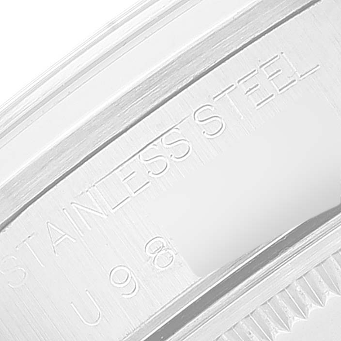 This close-up image of the Rolex Air-King 14000 Men's Stainless Steel Pink Dial 14000 Men's Stainless Steel Pink Dial shows the side casing with "STAINLESS STEEL" engraving.