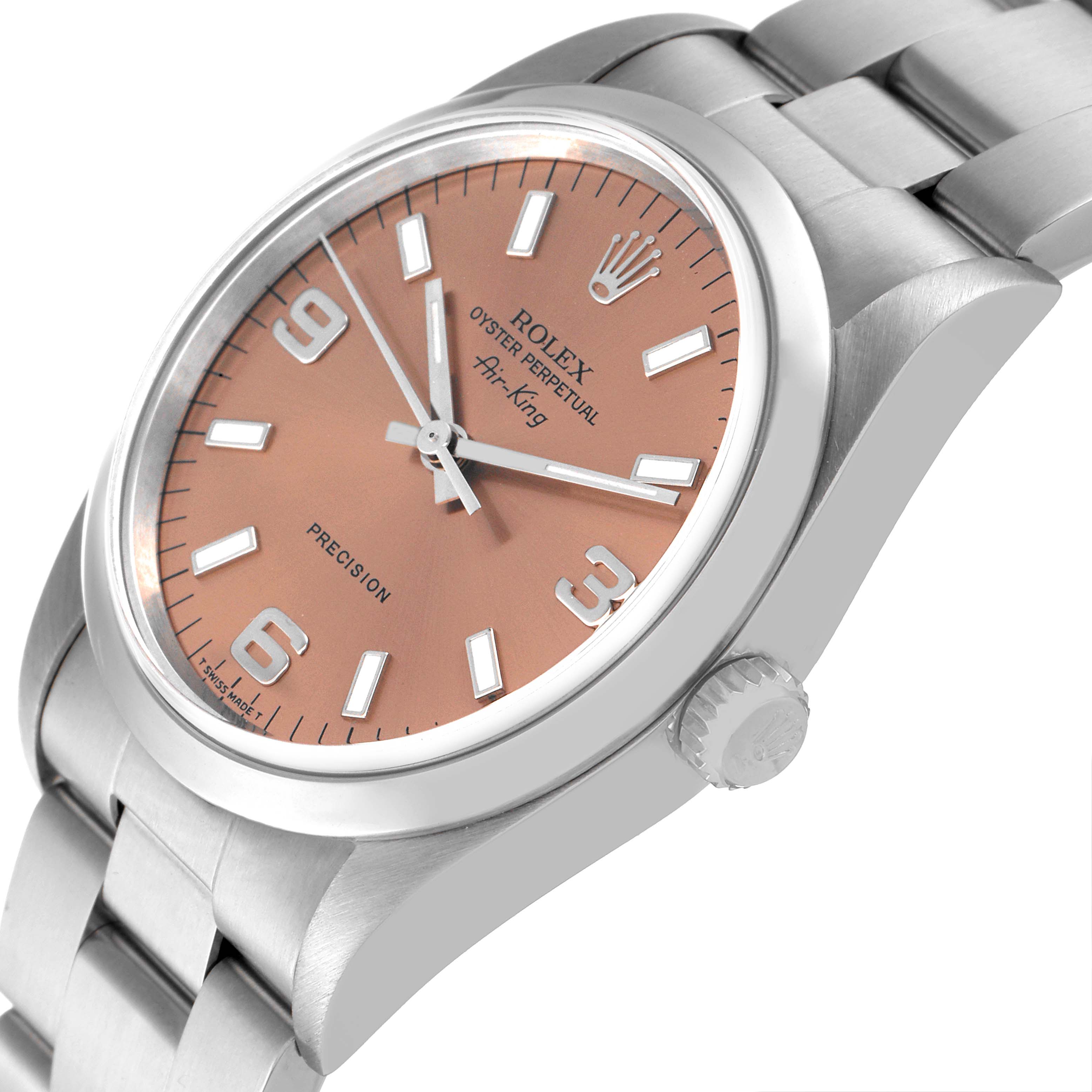 The image shows a close-up side angle of a Rolex Air-King 14000 Men's Stainless Steel Pink Dial 14000 Men's Stainless Steel Pink Dial watch, highlighting its face, bezel, and bracelet.