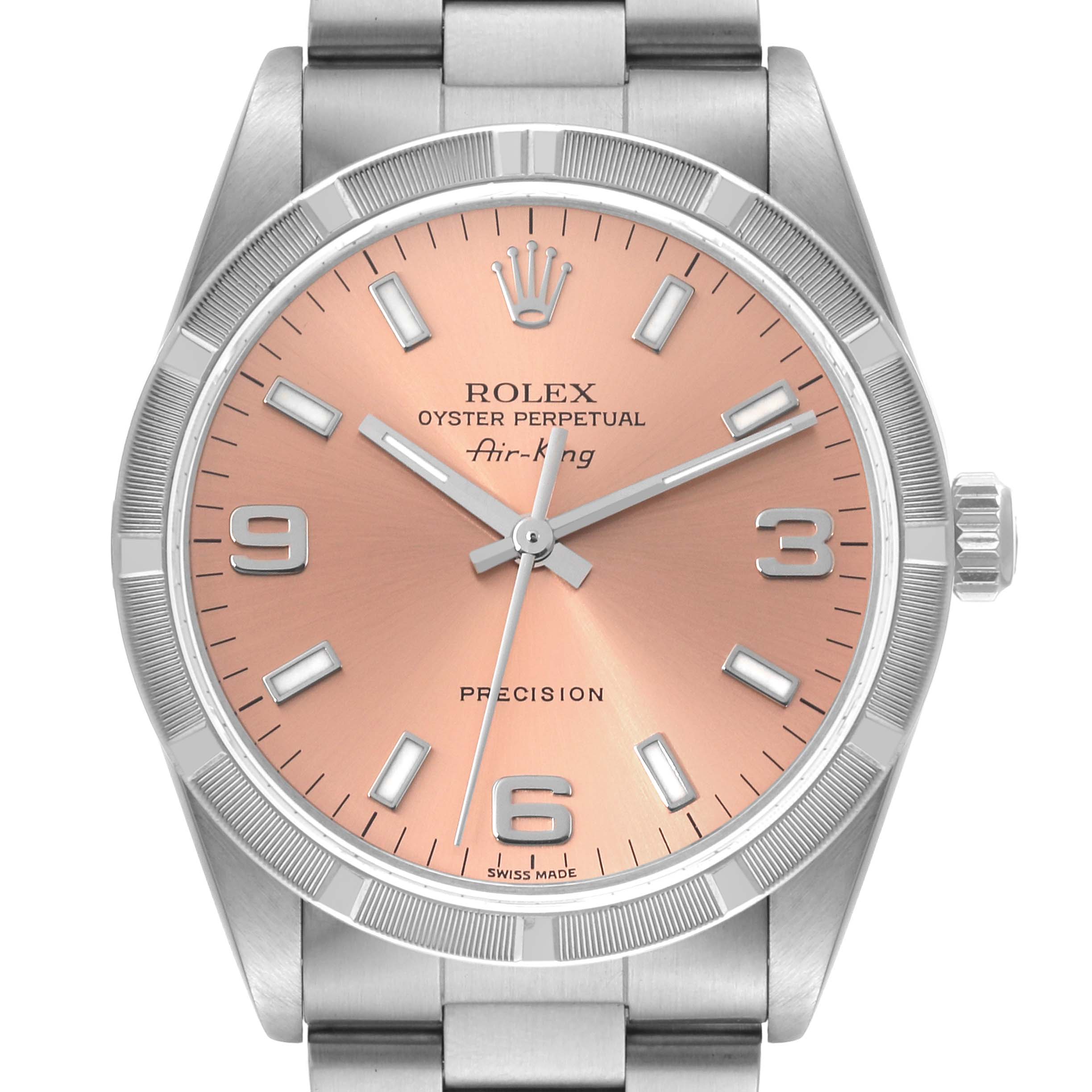 The Rolex Air-King 14010 Men's Stainless Steel Pink Dial 14010 Men's Stainless Steel Pink Dial watch is shown from a front angle, displaying its dial, bezel, hands, and bracelet.