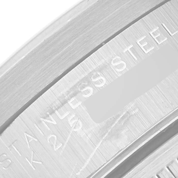 This is a close-up of the inner part of the Rolex Air-King 14010 Men's Stainless Steel Pink Dial 14010 Men's Stainless Steel Pink Dial watch case, showing the "Stainless Steel" engraving.