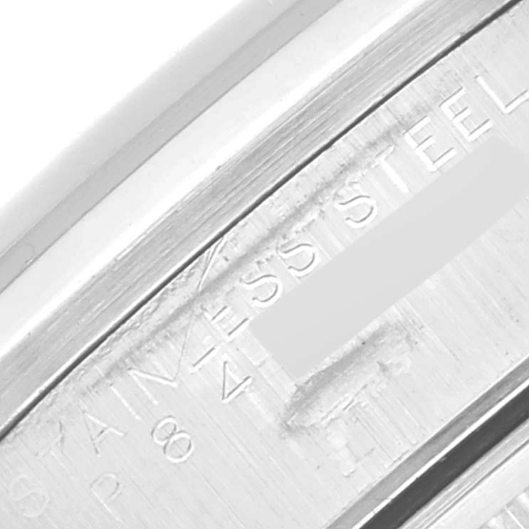 This close-up image shows the engraved stainless steel case detail of a Rolex Air-King 14000 Men's Stainless Steel Black Dial 14000 Men's Stainless Steel Black Dial watch.