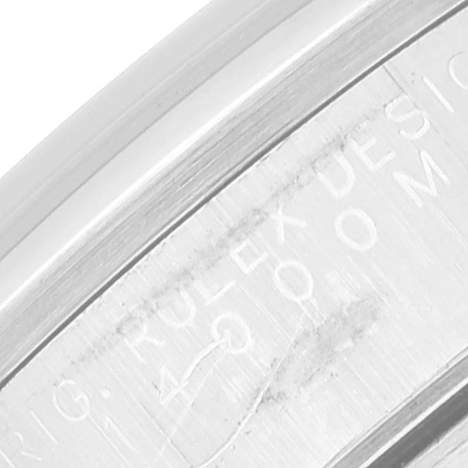 This close-up image shows the engraved side of the Rolex Air-King 14000 Men's Stainless Steel Black Dial 14000 Men's Stainless Steel Black Dial model watch case.