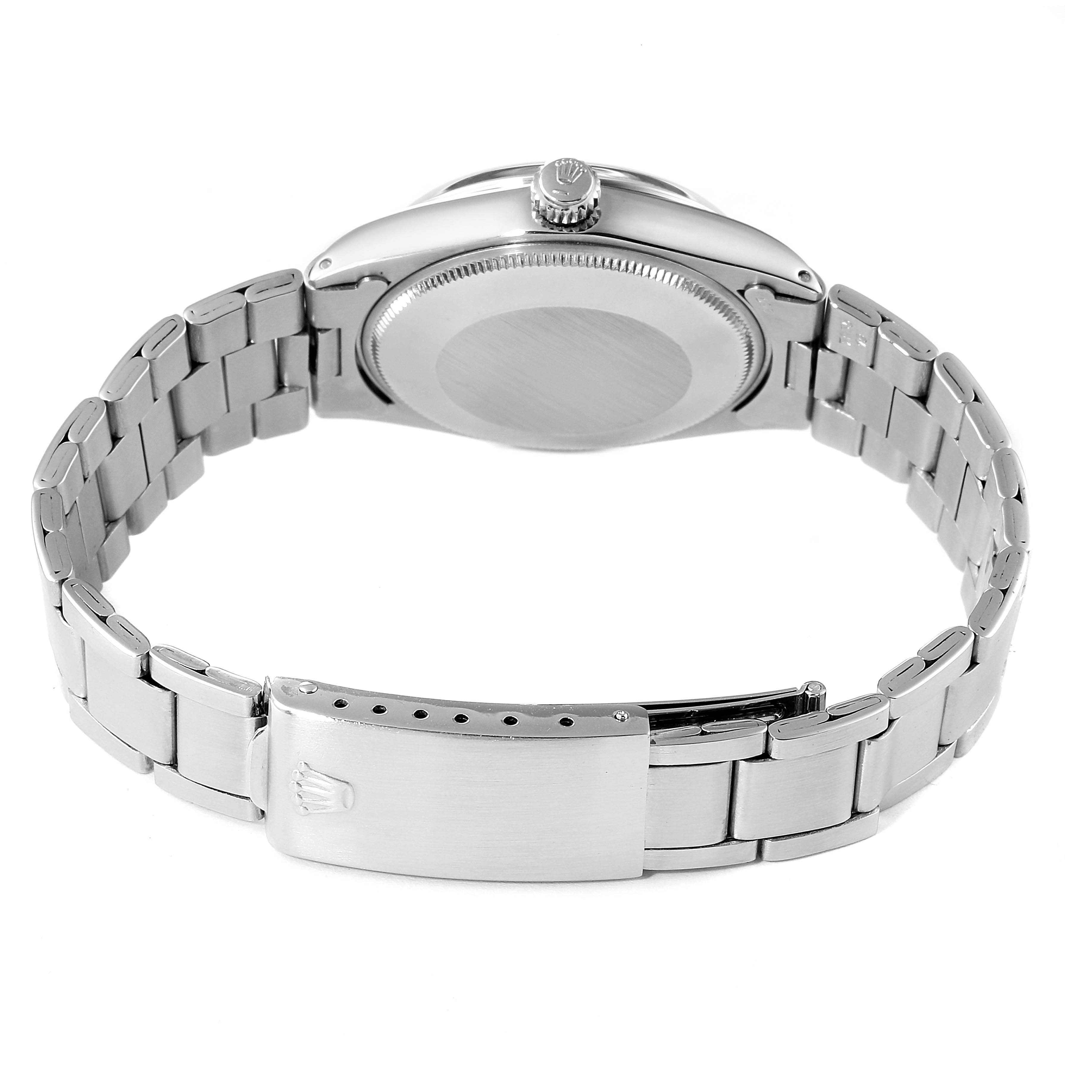 This image shows the back view of a Rolex Vintage Collection 5500 Men
s Stainless Steel Silver Dial 5500 Men
s Stainless Steel Silver Dial watch, highlighting its bracelet and deployment clasp.