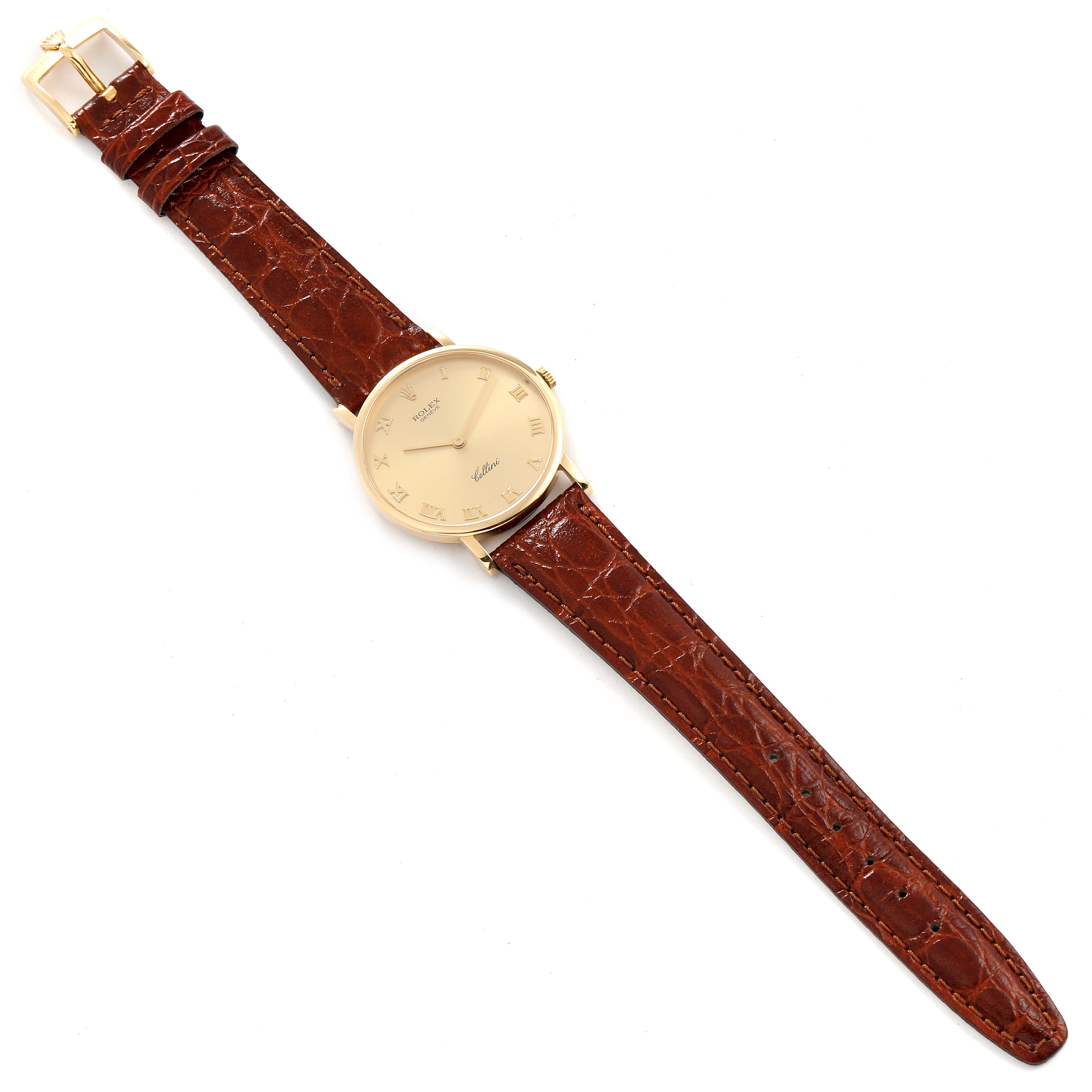 The image shows a full view of a Rolex Cellini 5112 Men's Yellow Gold Champagne Dial 5112 Men's Yellow Gold Champagne Dial watch with a gold dial and brown leather strap, viewed from above.