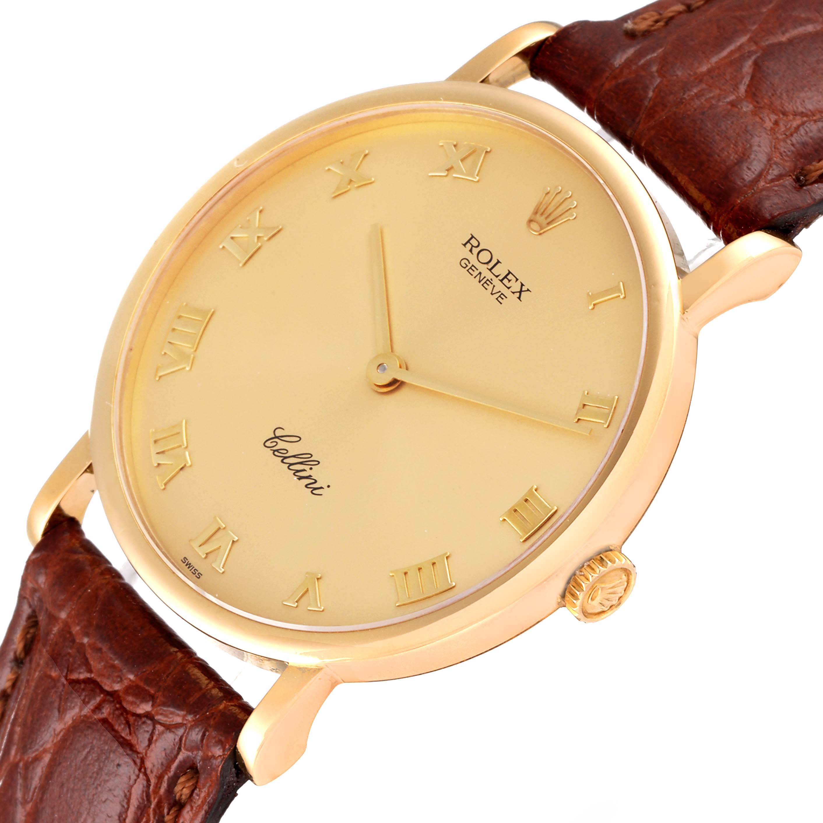 The Rolex Cellini 5112 Men's Yellow Gold Champagne Dial 5112 Men's Yellow Gold Champagne Dial watch is shown at an angle displaying its gold case, brown leather strap, and engraved Roman numeral dial.