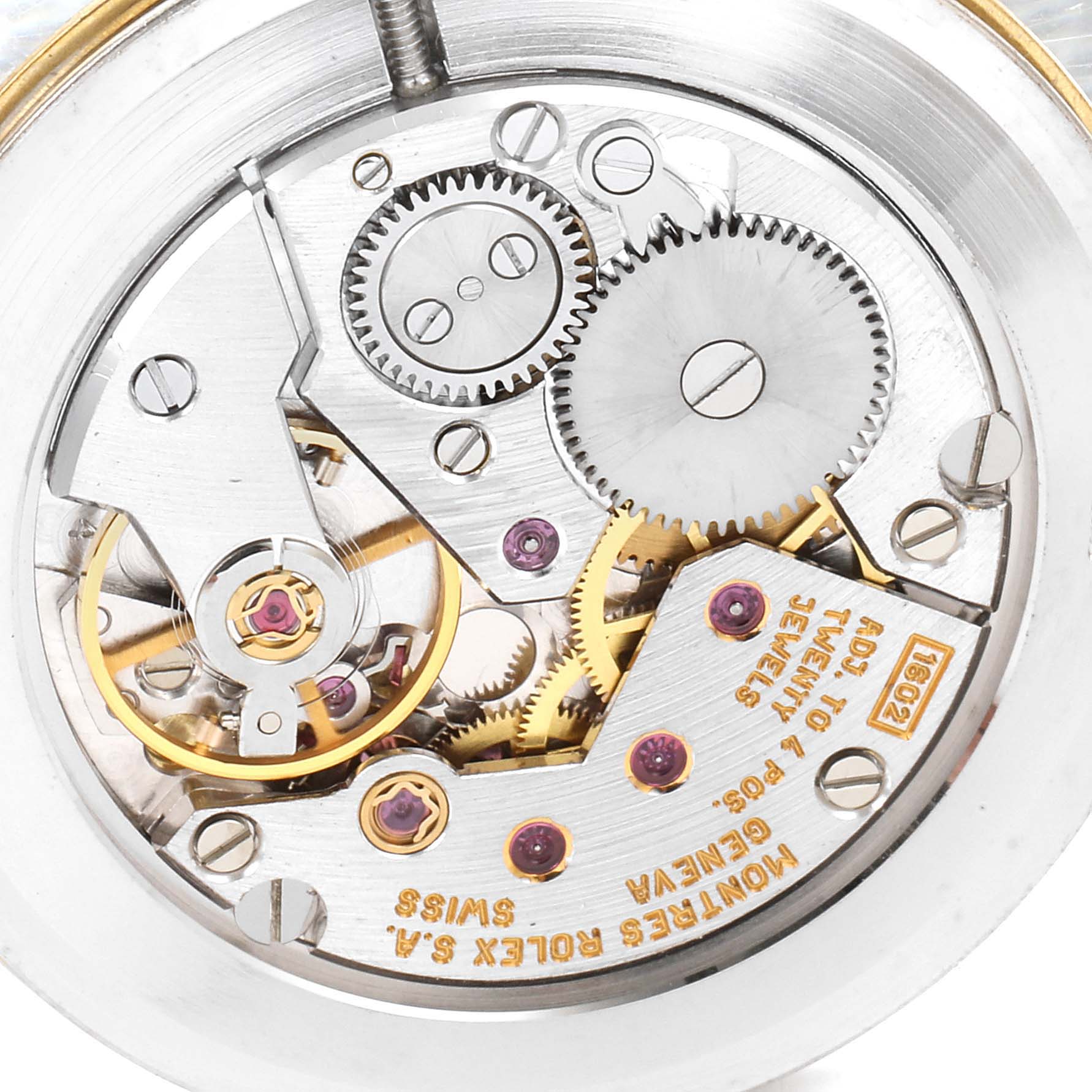 This image shows the internal mechanism of a Rolex Cellini 5112 Men's Yellow Gold Champagne Dial 5112 Men's Yellow Gold Champagne Dial watch, focusing on its intricate gears and components.
