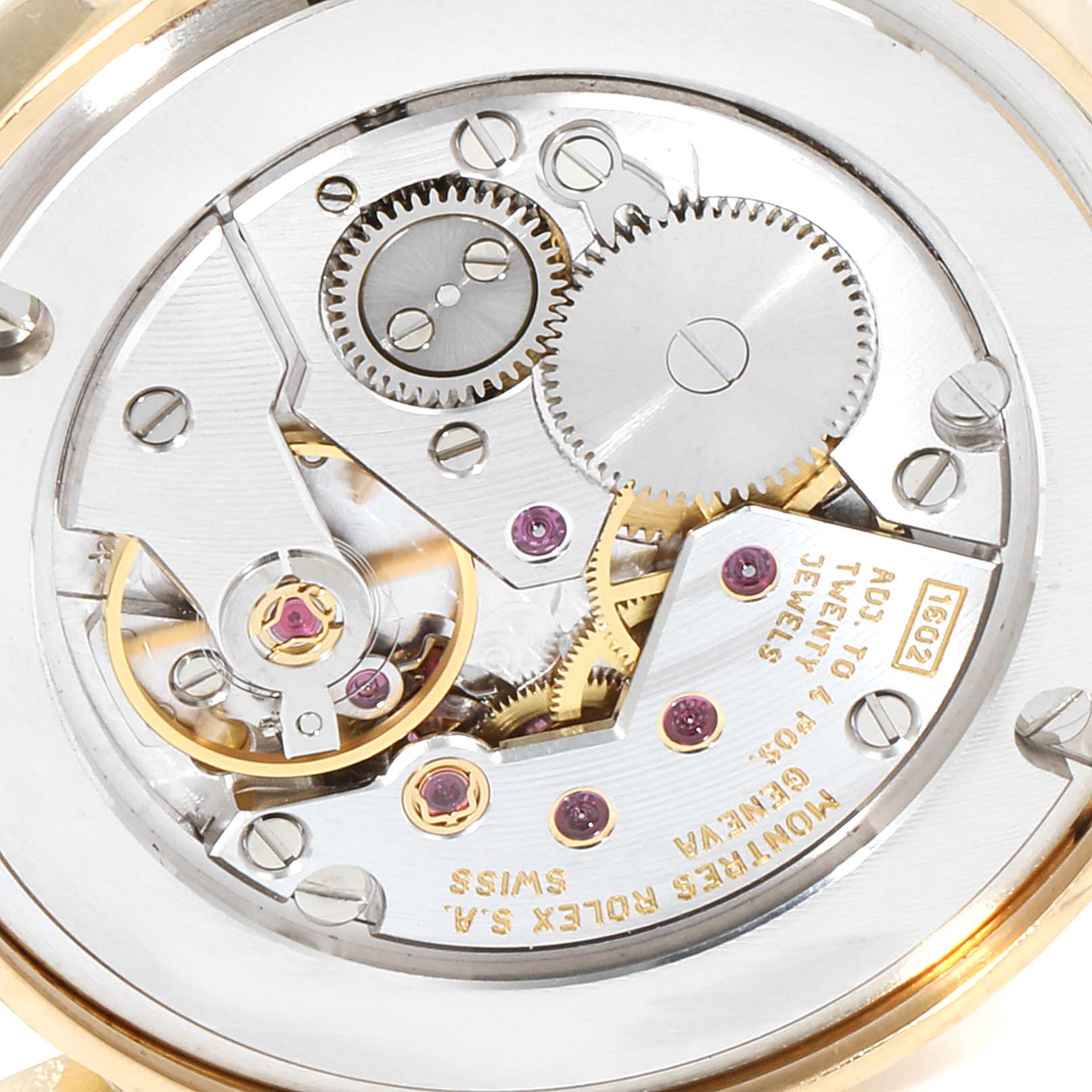 The image shows the internal mechanical movement components of a Rolex Cellini 5115 Men's Yellow Gold Silver Dial 5115 Men's Yellow Gold Silver Dial watch from a close-up angle.