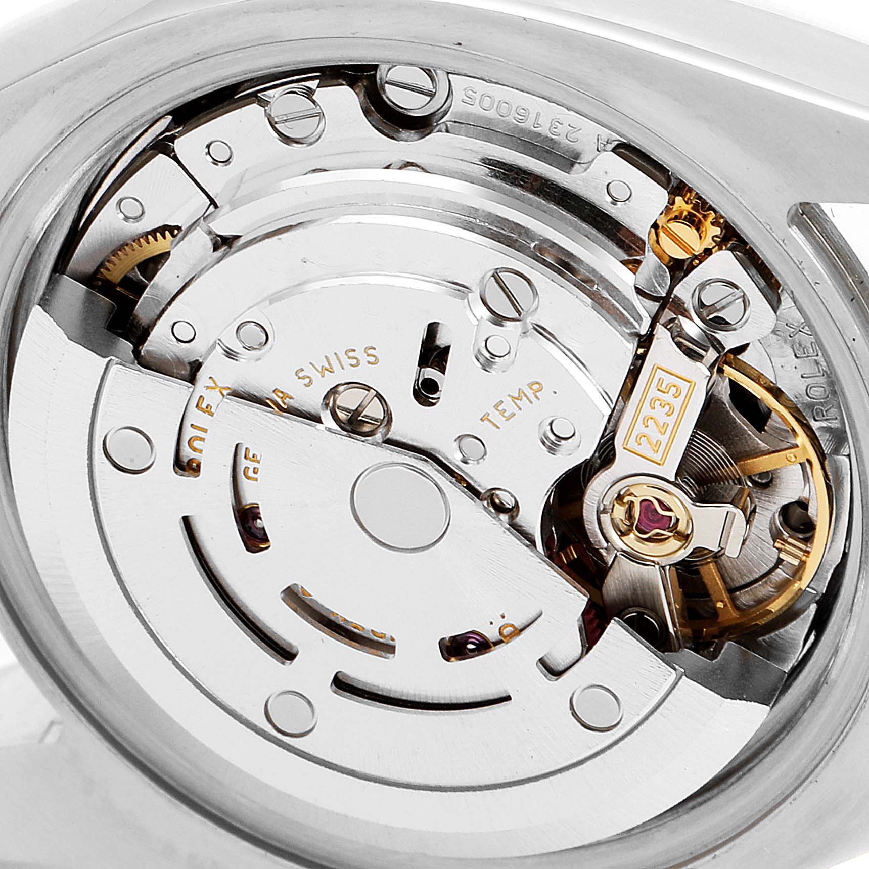 This image shows a close-up of the movement and inner mechanics of a Rolex Datejust 179173 Women's Steel and Gold (two tone) Green Dial 179173 Women's Steel and Gold (two tone) Green Dial watch, showcasing its intricate components.