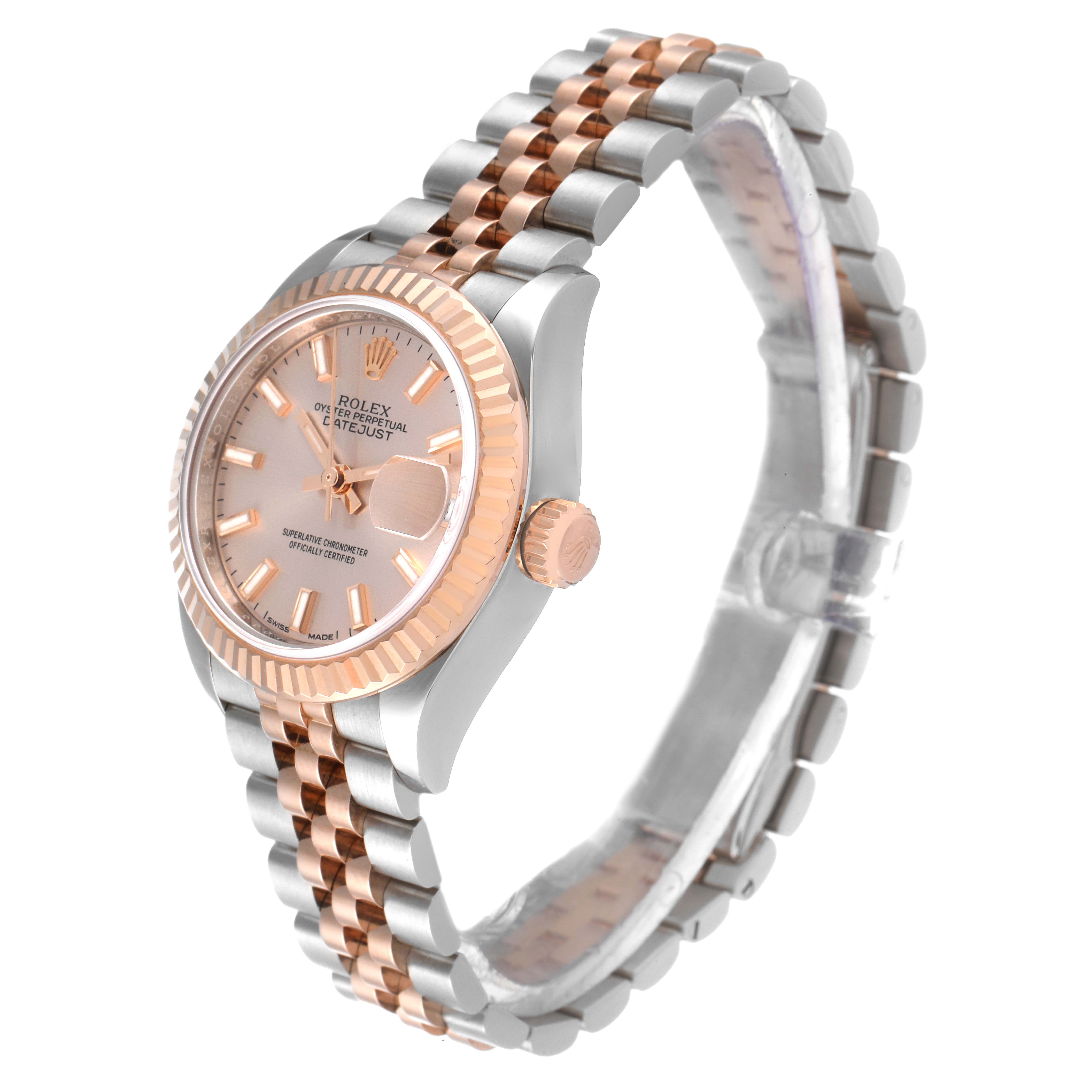The Rolex Datejust 279171 Women's Steel and Gold (two tone) Pink Dial 279171 Women's Steel and Gold (two tone) Pink Dial watch is shown from a 3/4 angle, displaying its face, crown, and part of the Jubilee bracelet.