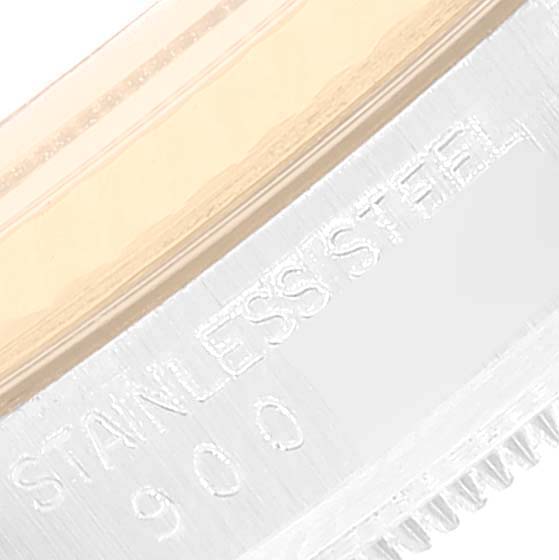 This image shows a close-up of the stainless steel bezel engraving on a Rolex Datejust 16013 Men
s Steel and Gold (two tone) Champagne Dial 16013 Men
s Steel and Gold (two tone) Champagne Dial watch.