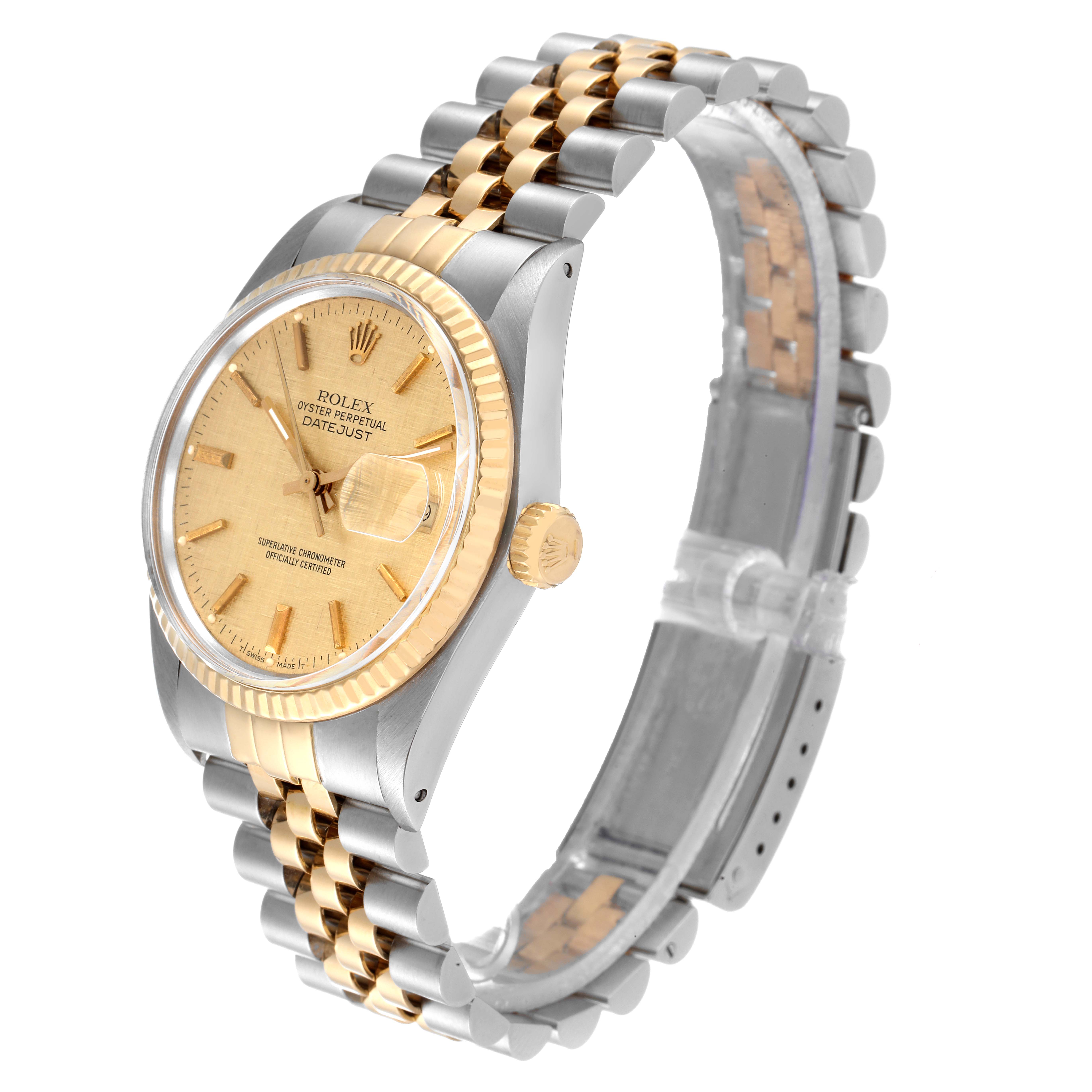 The image shows a Rolex Datejust 16013 Men
s Steel and Gold (two tone) Champagne Dial 16013 Men
s Steel and Gold (two tone) Champagne Dial watch at an angled side view, highlighting the dial, bezel, crown, and two-tone bracelet.