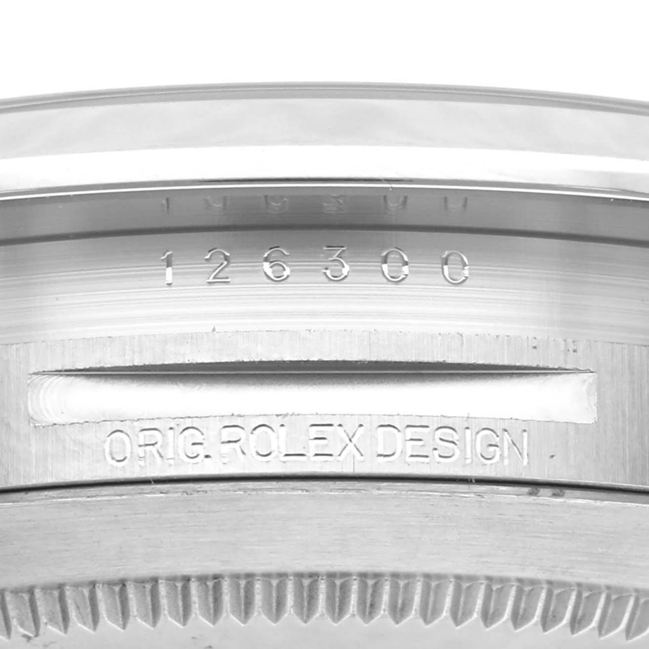This image shows a close-up of the case back and serial number engraving on a Rolex Datejust 41 126300 Men
s Stainless Steel Grey Dial 126300 Men
s Stainless Steel Grey Dial model.
