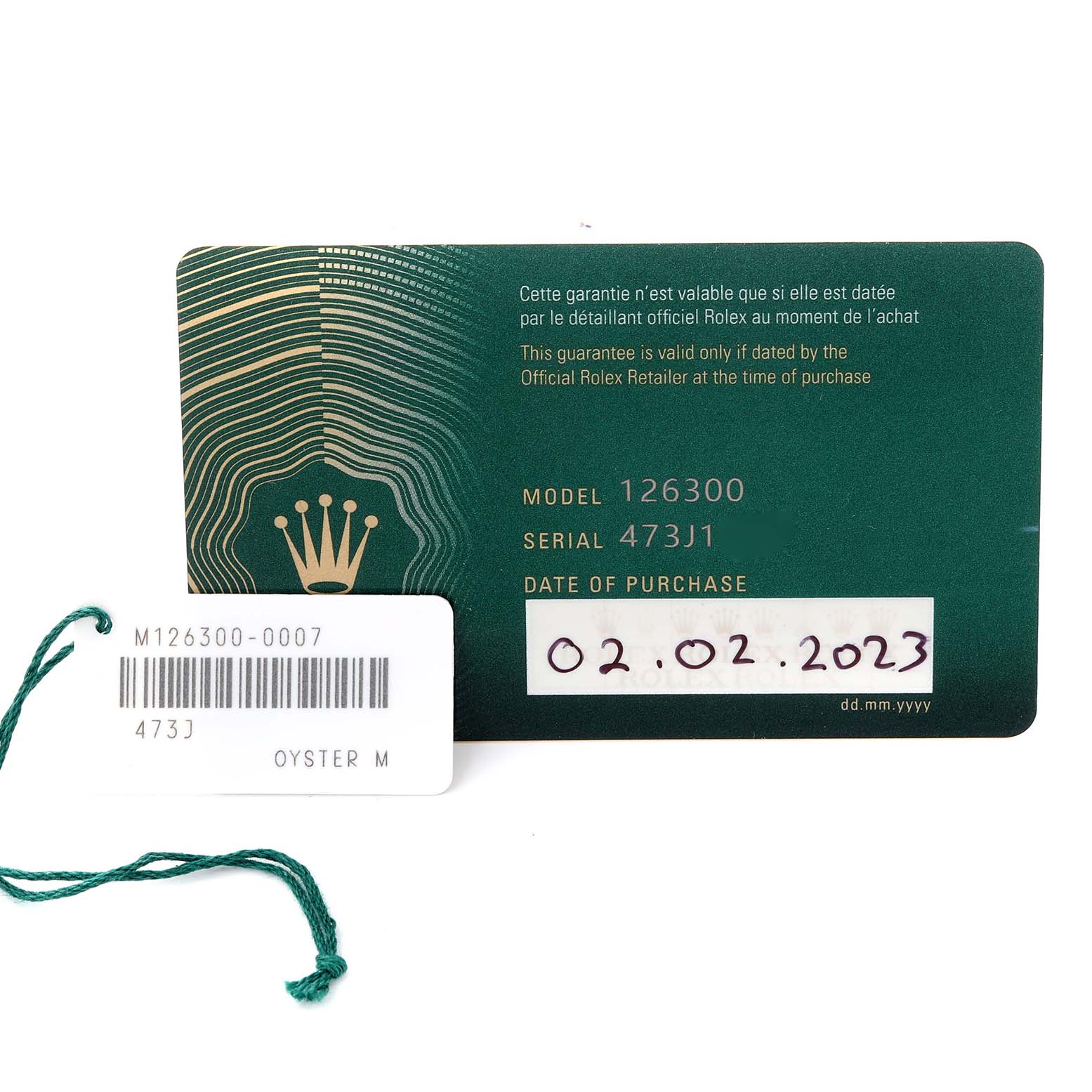 The image shows the warranty card and tag for the Rolex Datejust 41 126300 Men
s Stainless Steel Grey Dial 126300 Men
s Stainless Steel Grey Dial model, including the model and serial numbers, and date of purchase.