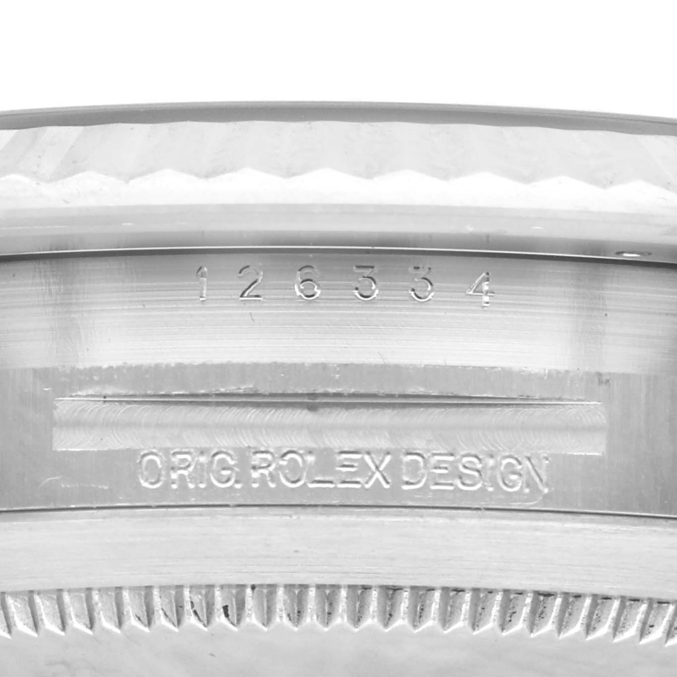 This image shows a close-up of the case side of the Rolex Datejust 41 126334 Men's Stainless Steel Grey Dial 126334 Men's Stainless Steel Grey Dial, displaying the model number and engraving.