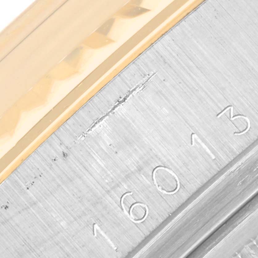 The image shows a close-up of the case side and bezel of a Rolex Datejust 16013 Men's Steel and Gold (two tone) Black Dial 16013 Men's Steel and Gold (two tone) Black Dial watch with the reference number 16013 engraved.