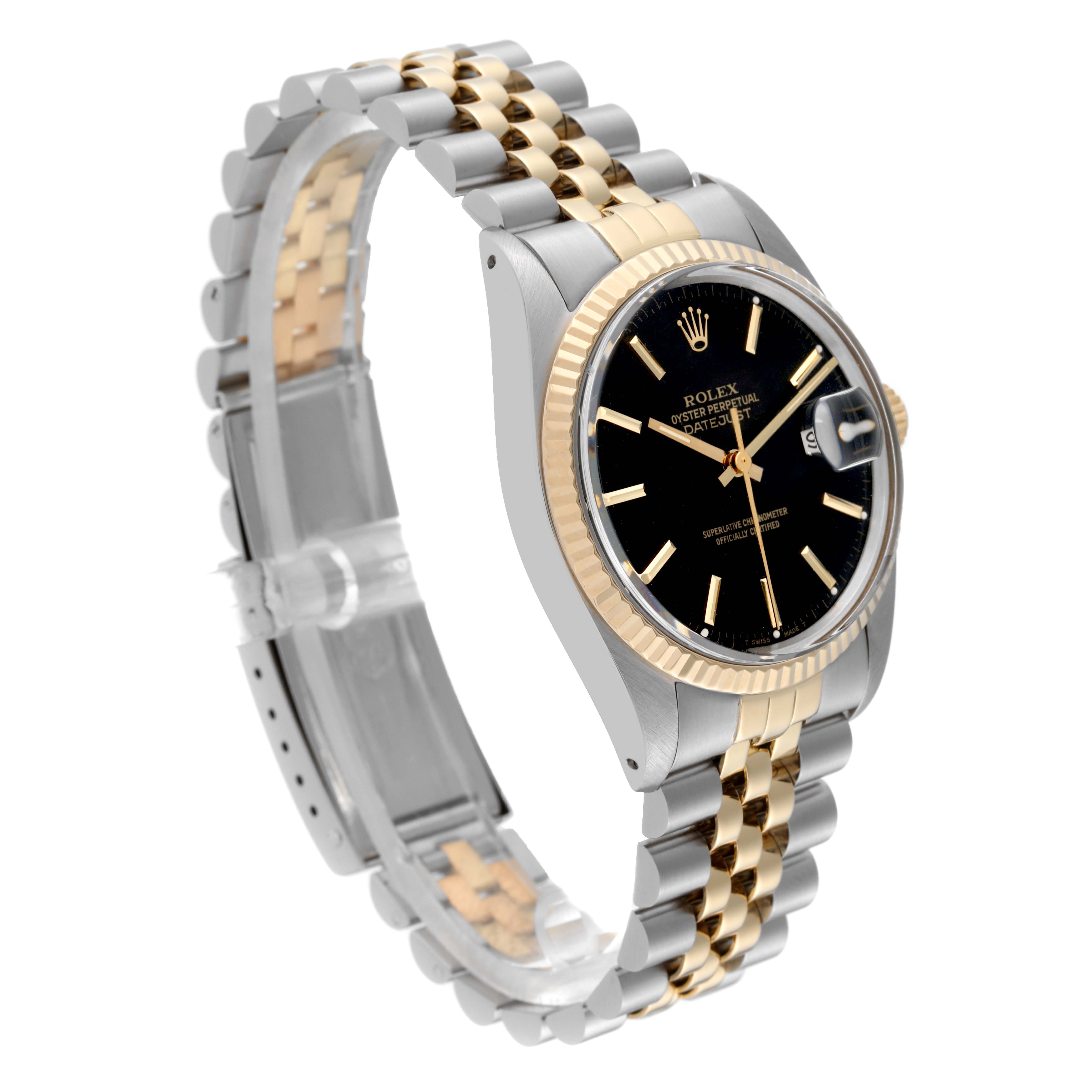 The Rolex Datejust 16013 Men's Steel and Gold (two tone) Black Dial 16013 Men's Steel and Gold (two tone) Black Dial watch is displayed at an angle showing the face, bezel, and bi-tone bracelet.