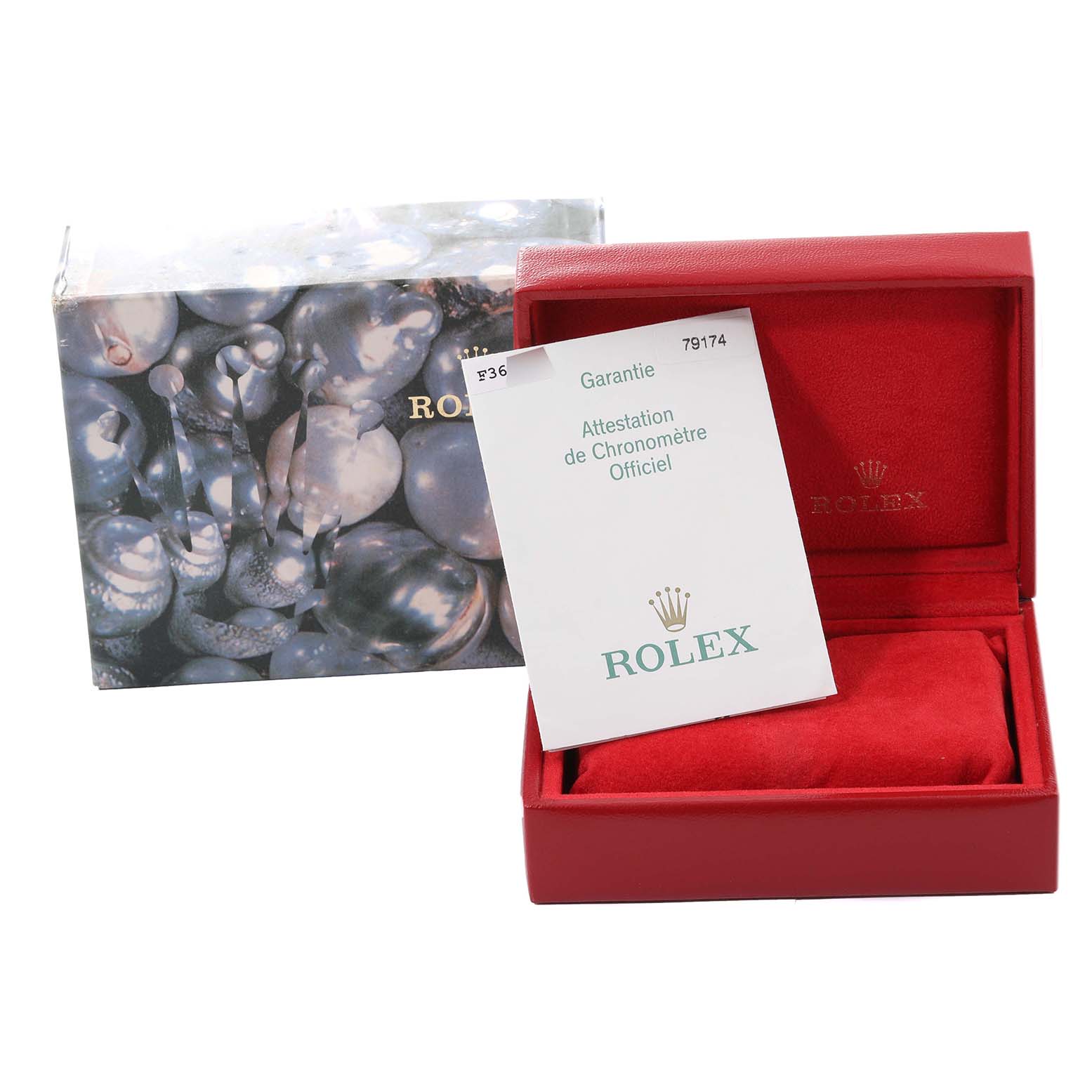 The image shows a Rolex Datejust 79174 Women's Steel and Gold (two tone) Mother of Pearl Dial 79174 Women's Steel and Gold (two tone) Mother of Pearl Dial watch box with a warranty certificate and packaging.