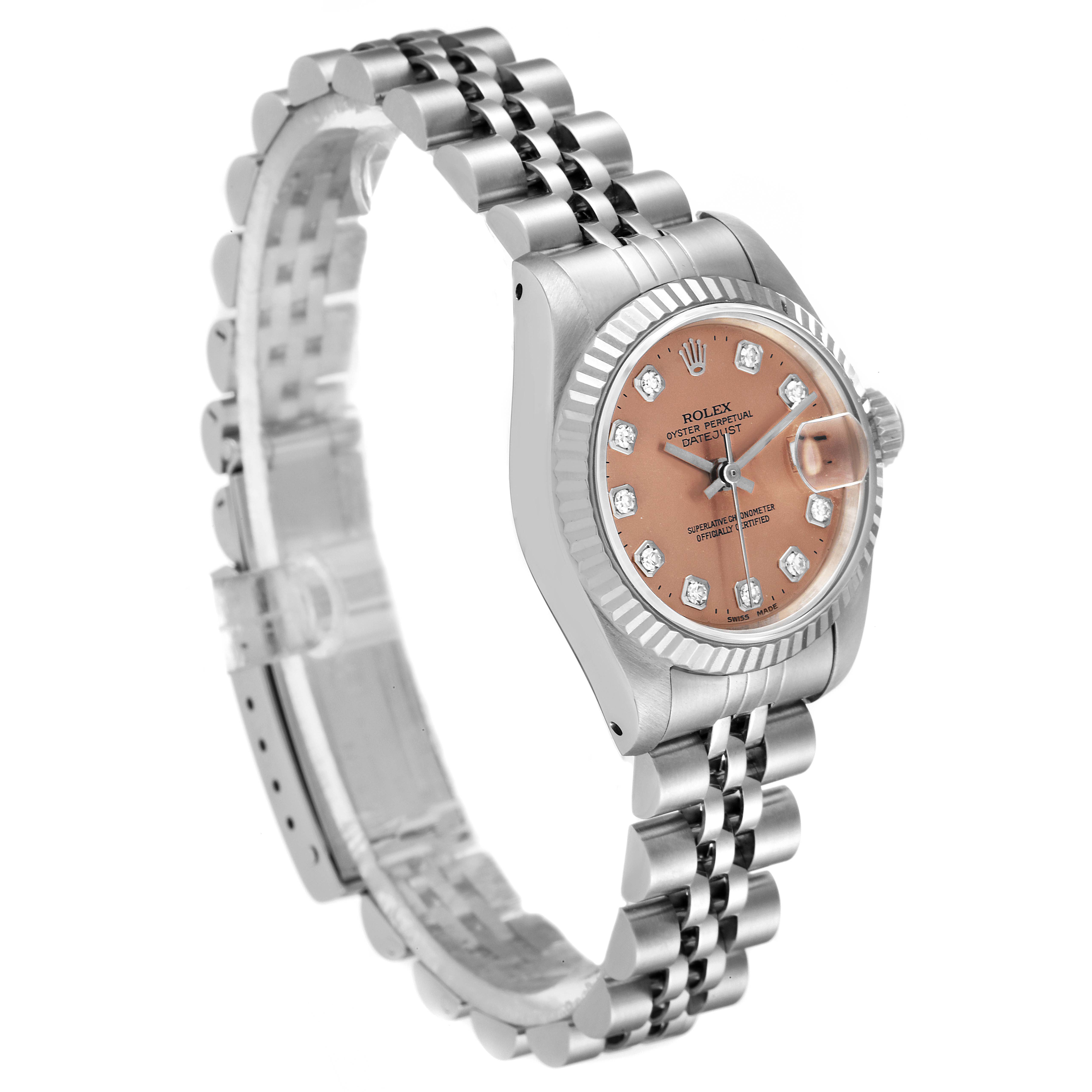 The image shows a Rolex Datejust 79174 Women's Stainless Steel Pink Dial 79174 Women's Stainless Steel Pink Dial watch from an angle highlighting the bracelet, case, bezel, dial, and crown.