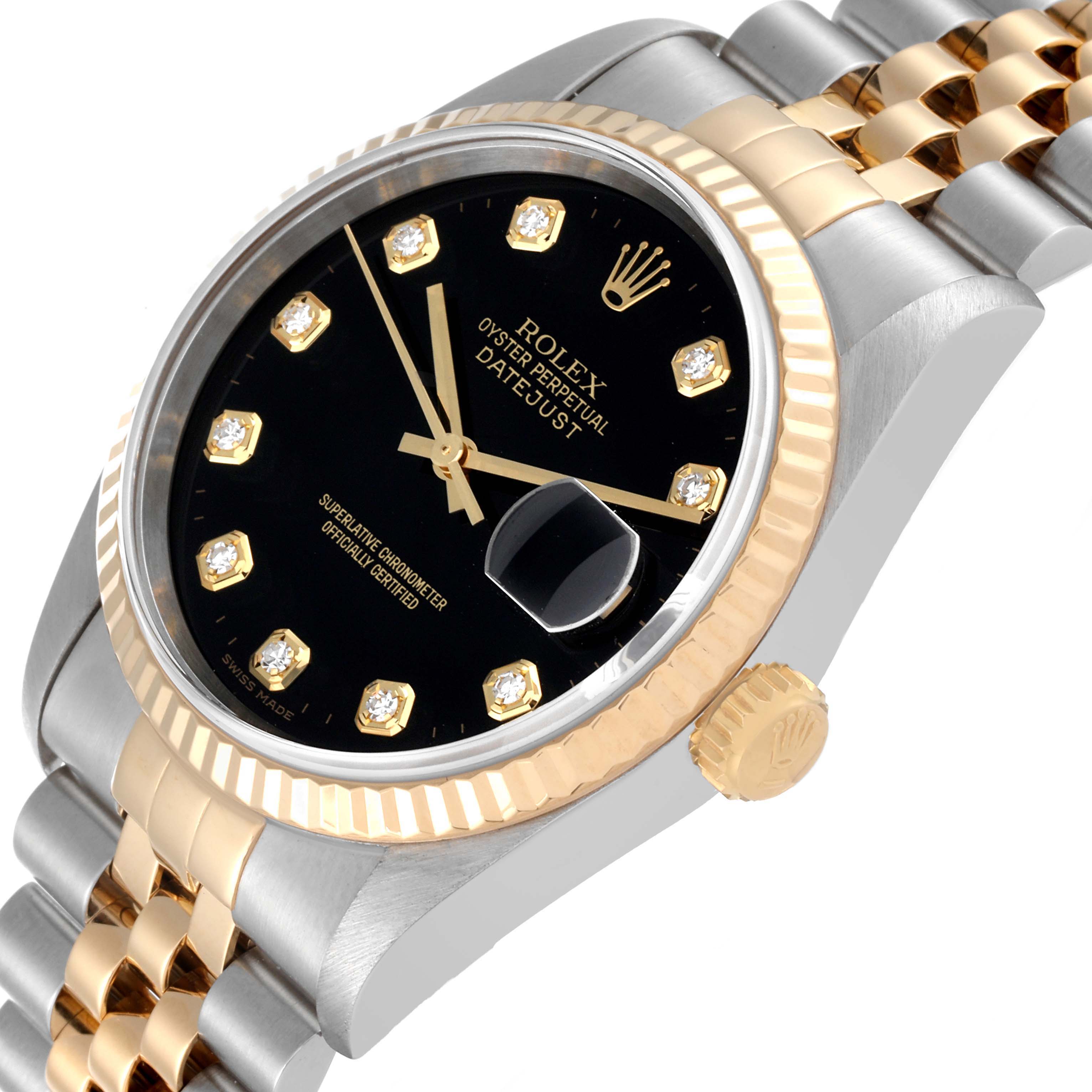 The image shows a close-up of the Rolex Datejust 16233 Men's Steel and Gold (two tone) Black Dial 16233 Men's Steel and Gold (two tone) Black Dial watch's dial, bezel, and part of the bracelet from an angled side view.