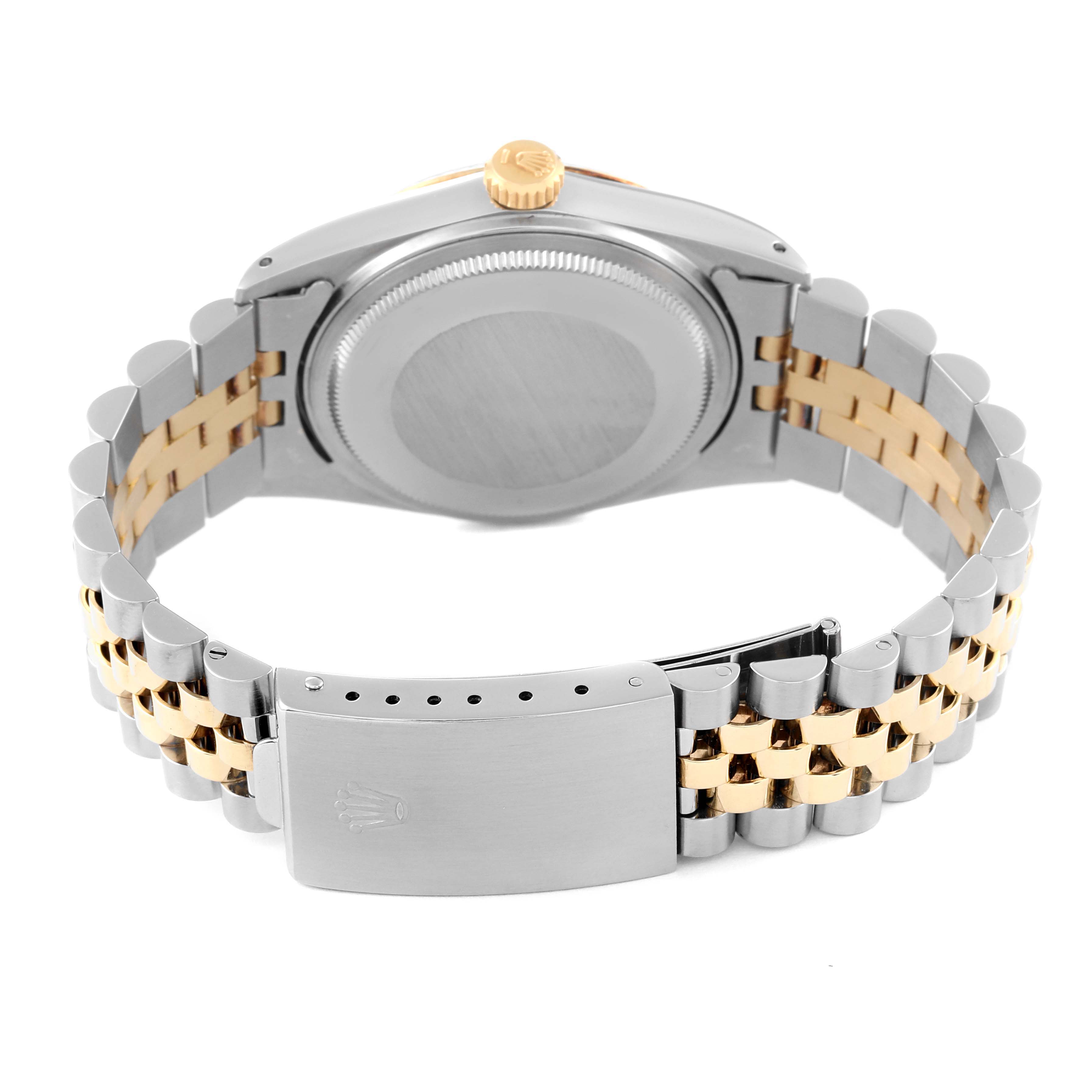 The image shows the back view of a Rolex Datejust 16013 Men's Steel and Gold (two tone) Champagne Dial 16013 Men's Steel and Gold (two tone) Champagne Dial watch, displaying its case back, crown, and two-tone jubilee bracelet with a clasp.