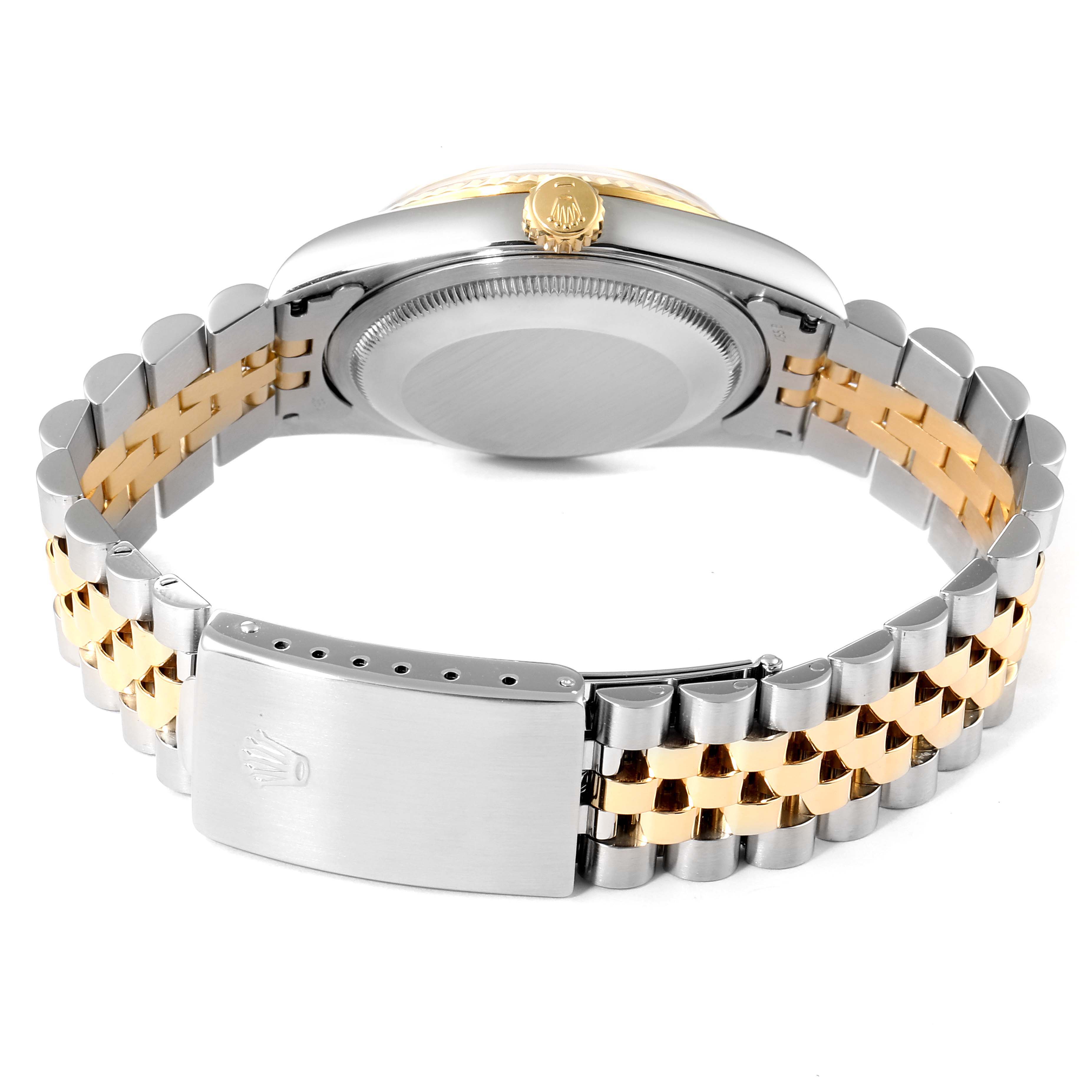 This image shows the back view of a Rolex Datejust 16233 Men's Steel and Gold (two tone) White Dial 16233 Men's Steel and Gold (two tone) White Dial watch, highlighting its case back, crown, and two-tone bracelet.