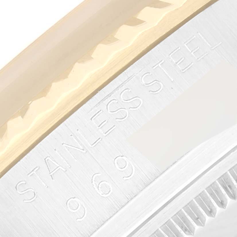 The image shows a close-up of the side and case of a Rolex Datejust 16013 Men's Steel and Gold (two tone) Champagne Dial 16013 Men's Steel and Gold (two tone) Champagne Dial, highlighting the "STAINLESS STEEL" engraving.