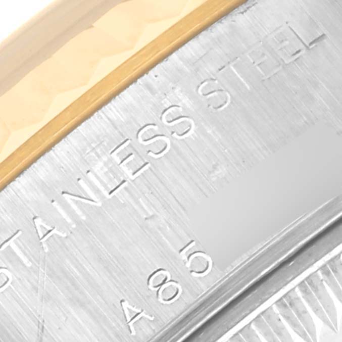 The image shows a close-up of the side of the Rolex Datejust 79173 Women's Steel and Gold (two tone) Blue Dial 79173 Women's Steel and Gold (two tone) Blue Dial model, highlighting the stainless steel etching.