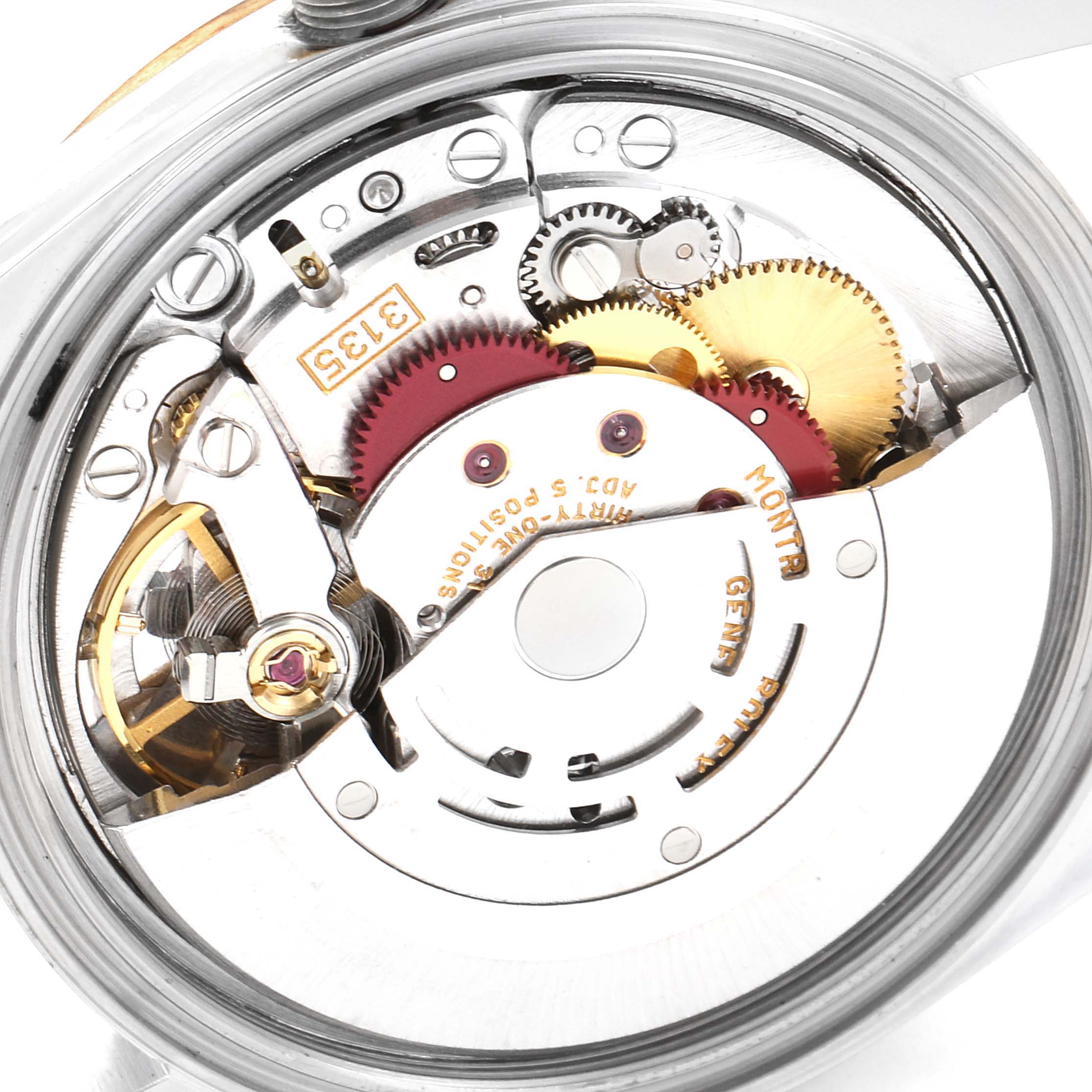 The image shows a close-up of the movement of a Rolex Datejust 16233 Men's Steel and Gold (two tone) White Dial 16233 Men's Steel and Gold (two tone) White Dial watch, revealing the intricate internal gears and components.