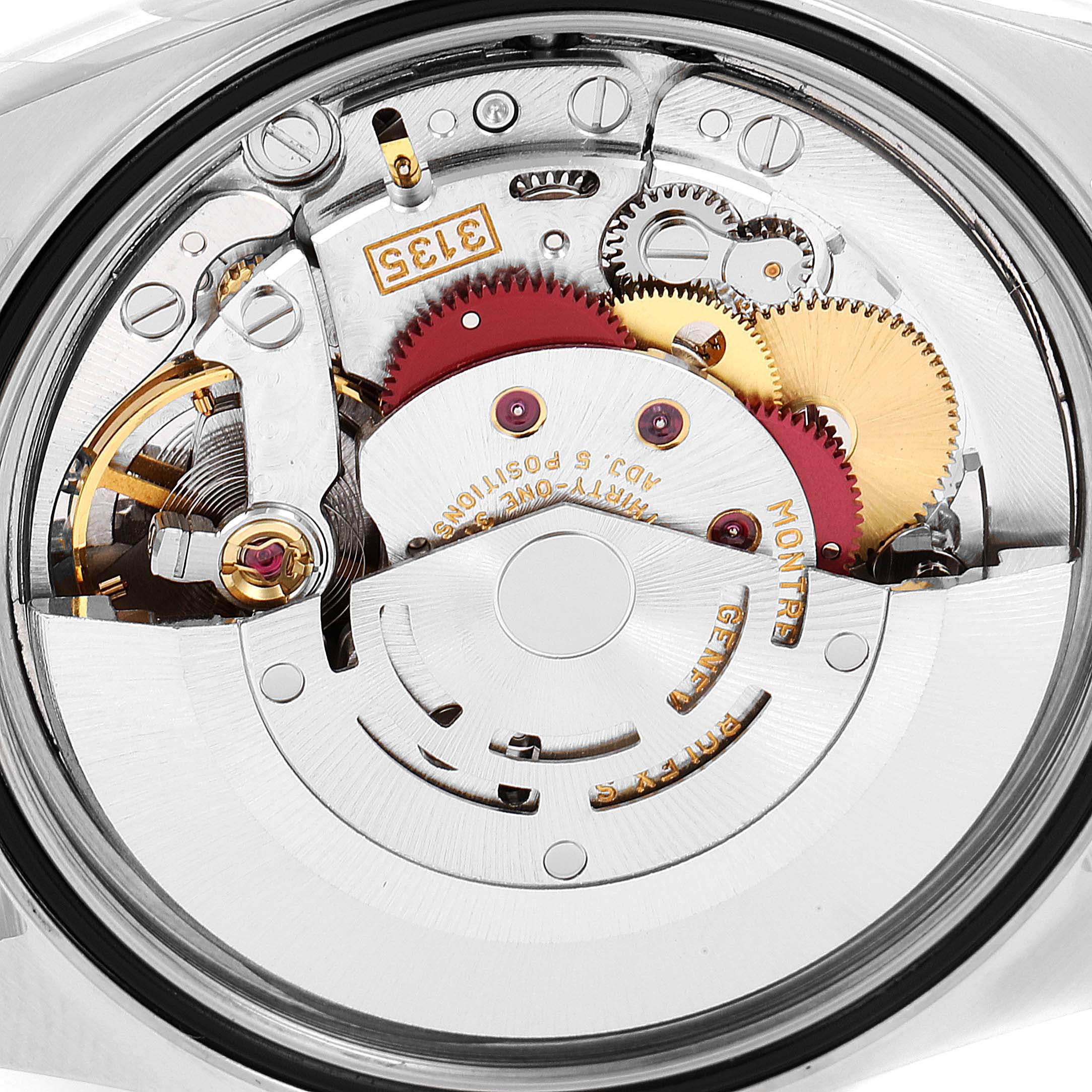 This image shows a close-up view of the movement mechanism inside a Rolex Datejust 16233 Men's Steel and Gold (two tone) White Dial 16233 Men's Steel and Gold (two tone) White Dial watch.