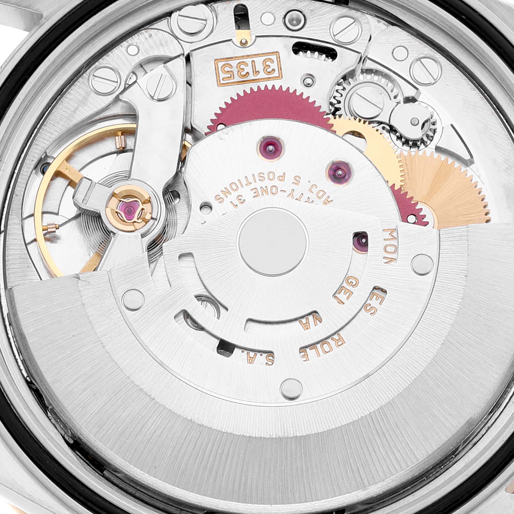 This image shows an angled close-up view of the Rolex Turn-o-Graph 16263 Men's Steel and Gold (two tone) White Dial 16263 Men's Steel and Gold (two tone) White Dial's internal mechanical movement and gears.