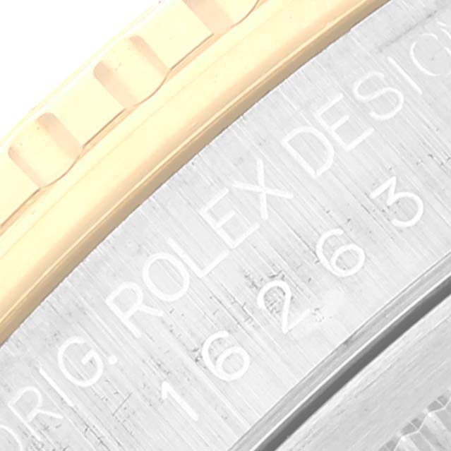The image shows a close-up view of the bezel and engraved side of the Rolex Turn-o-Graph 16263 Men's Steel and Gold (two tone) White Dial 16263 Men's Steel and Gold (two tone) White Dial watch.