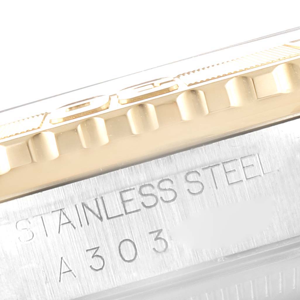 This close-up image shows the side of a Rolex Turn-o-Graph 16263 Men
s Steel and Gold (two tone) White Dial 16263 Men
s Steel and Gold (two tone) White Dial model, highlighting the bezel and the "Stainless Steel" engraving.