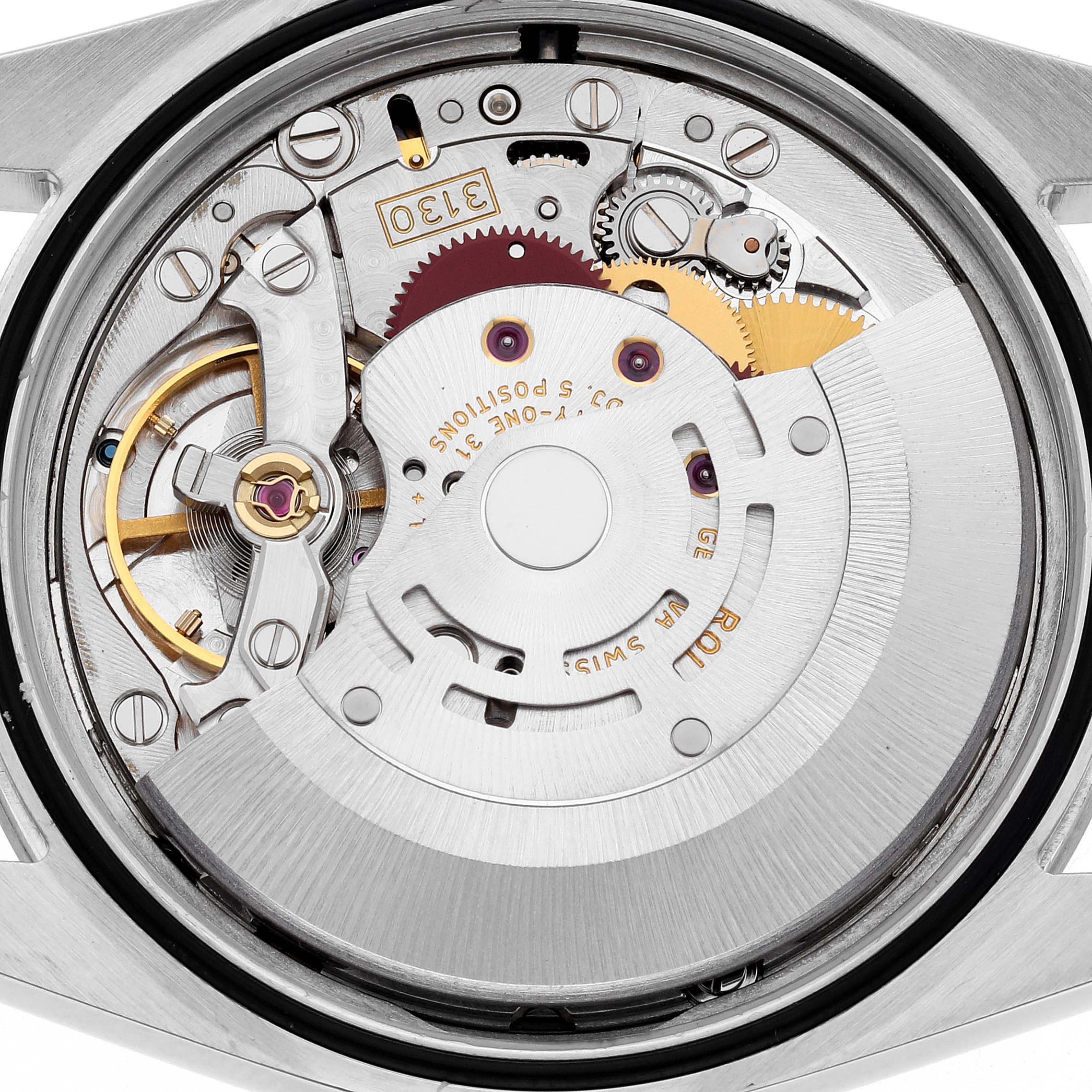 The image shows the internal mechanism of a Rolex Explorer 114270 Men
s Stainless Steel Black Dial 114270 Men
s Stainless Steel Black Dial watch, focusing on its movement components.