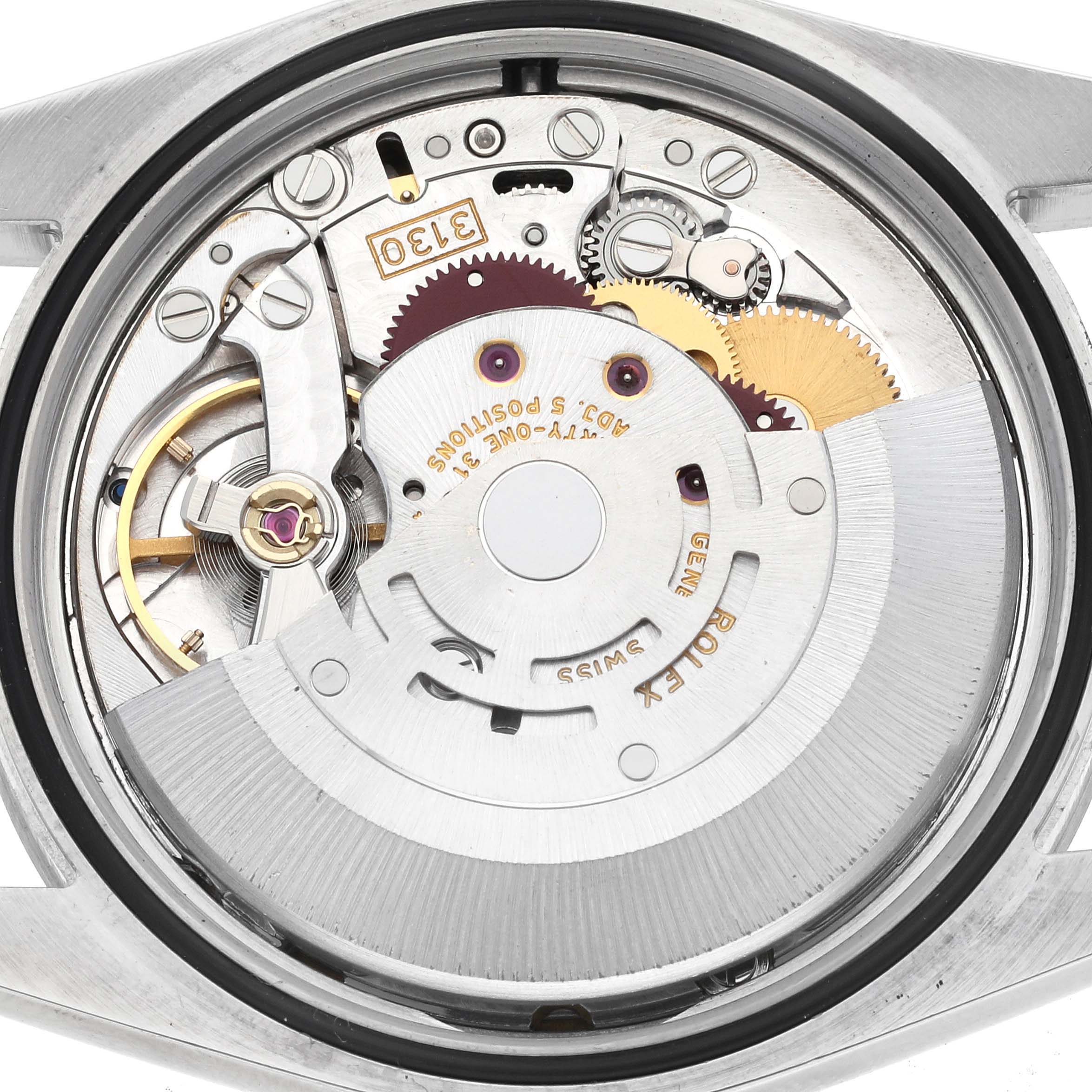 This image shows the internal mechanism of the Rolex Explorer 114270 Men
s Stainless Steel Black Dial 114270 Men
s Stainless Steel Black Dial watch, with gears and the movement parts visible.