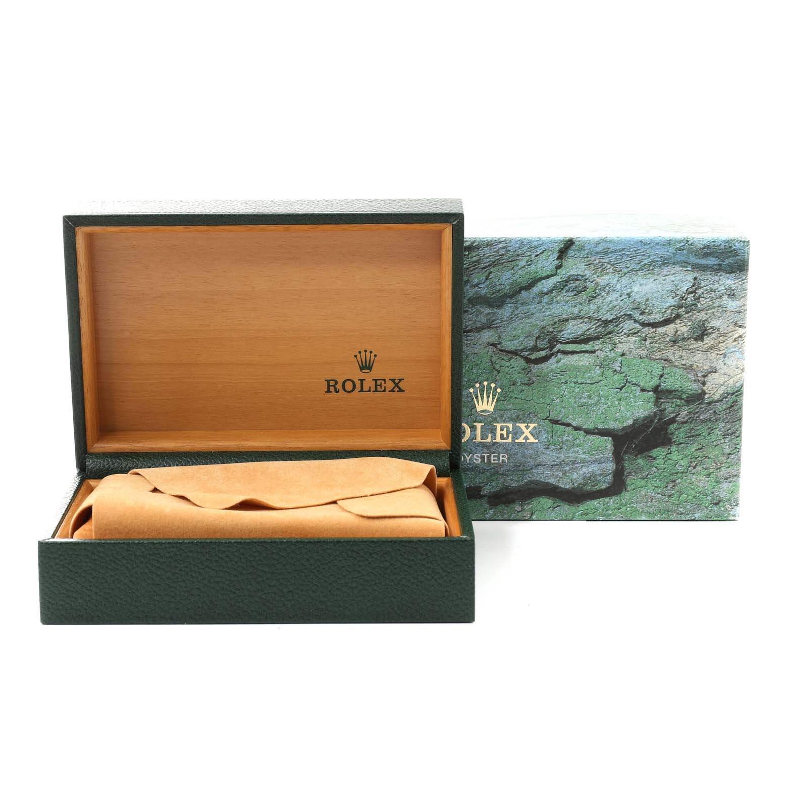 This image shows the open Rolex watch box for the Explorer model with the green outer box and brown leather cushion inside.