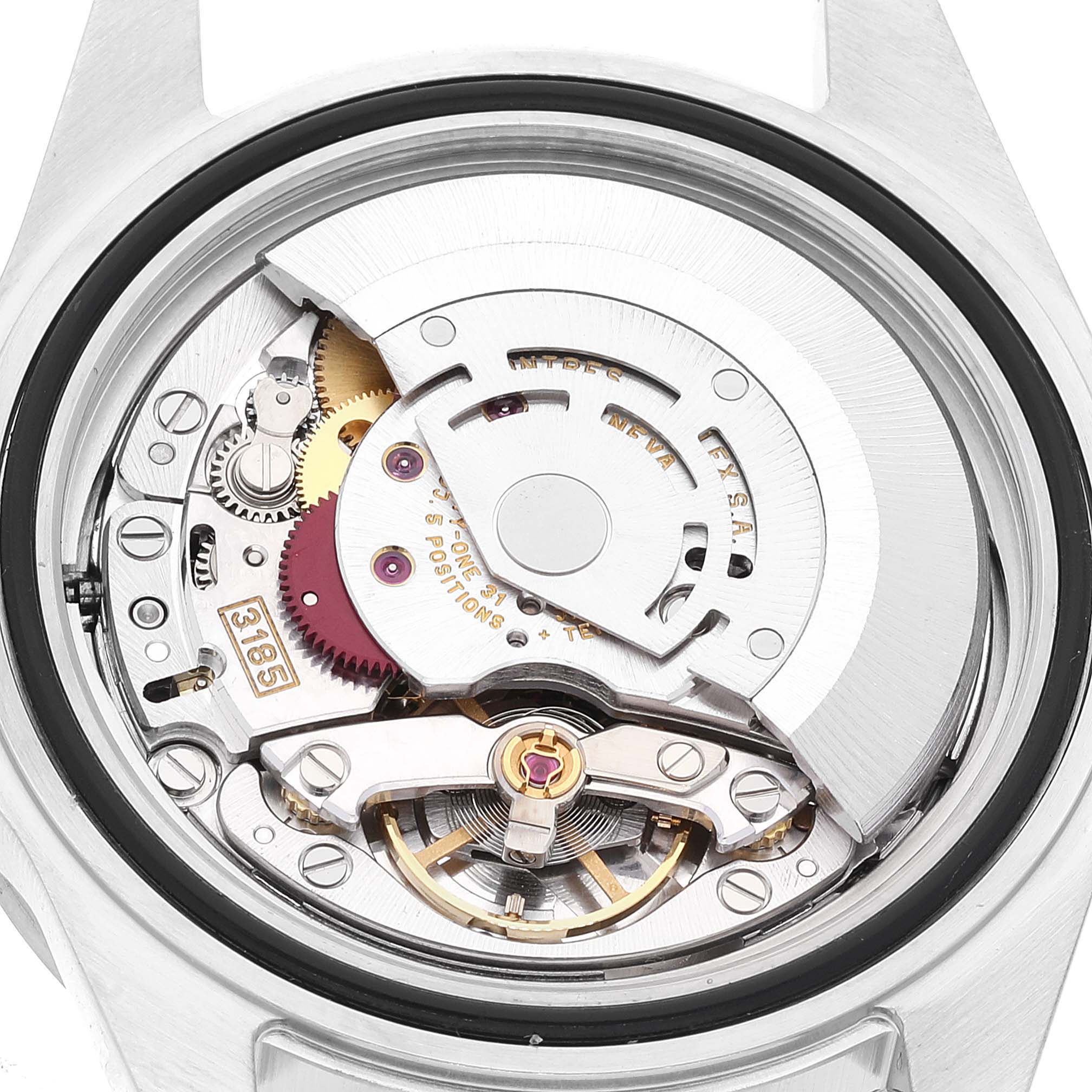 This is a close-up view of the movement of a Rolex Explorer 16570 Men's Stainless Steel White Dial 16570 Men's Stainless Steel White Dial watch, showcasing the intricate internal components.