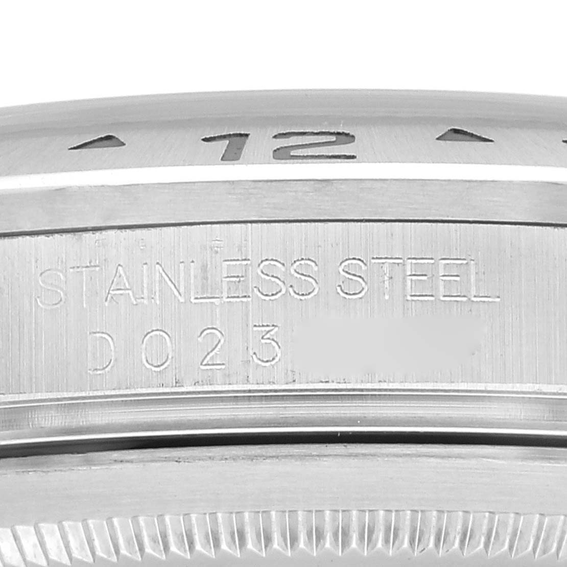 This image shows a close-up of the stainless steel case back with the model number of a Rolex Explorer 16570 Men's Stainless Steel White Dial 16570 Men's Stainless Steel White Dial watch.