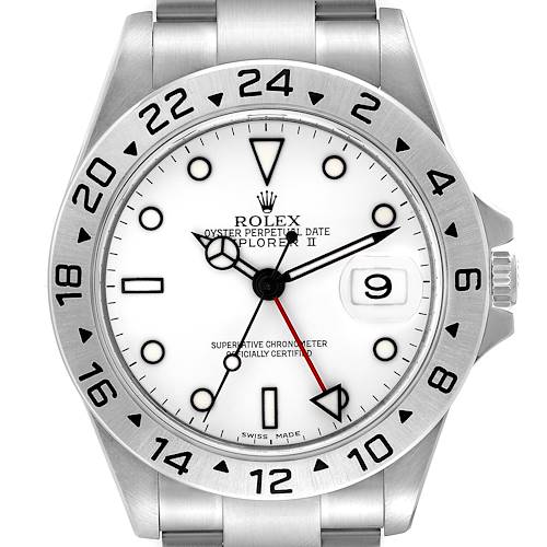 The image shows a front view of the Rolex Explorer II watch, featuring its dial, bezel, hands, and part of its bracelet.