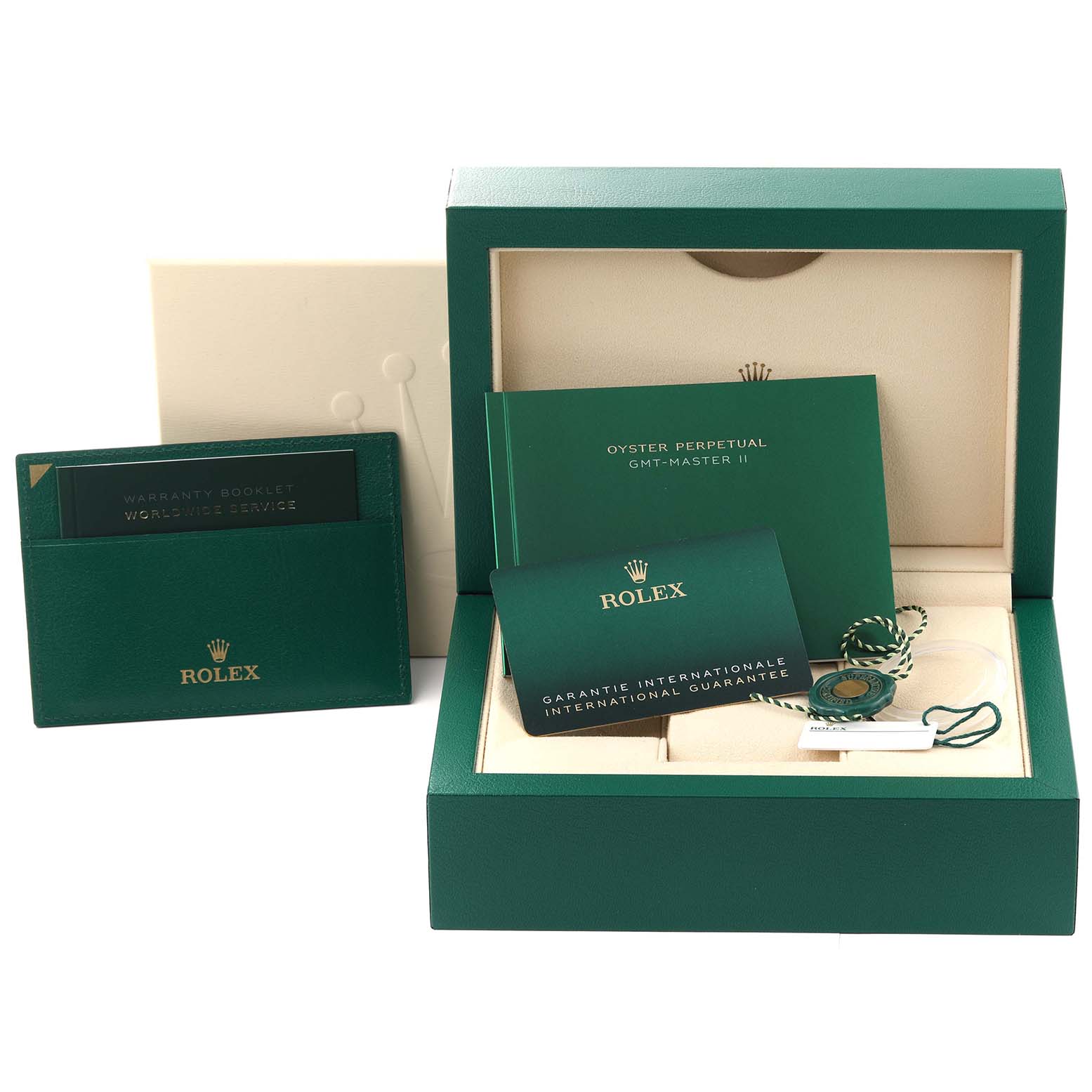 This image shows the packaging, warranty cards, and manuals for a Rolex GMT-Master 126710BLNR Men's Stainless Steel Black Dial 126710BLNR Men's Stainless Steel Black Dial watch.