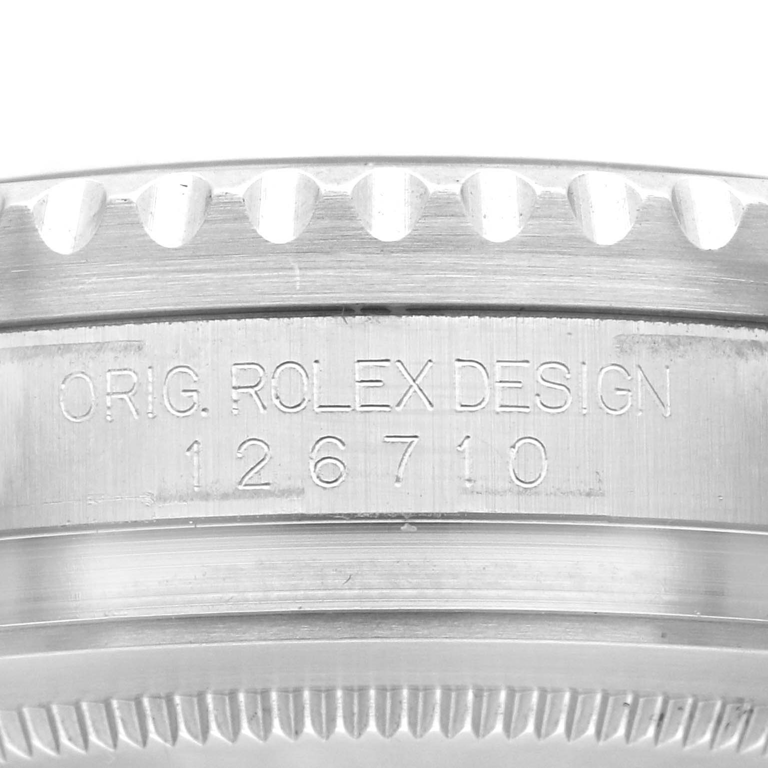 This image shows a close-up angle of the bezel and case of a Rolex GMT-Master 126710BLNR Men's Stainless Steel Black Dial 126710BLNR Men's Stainless Steel Black Dial model, displaying the model number "126710."