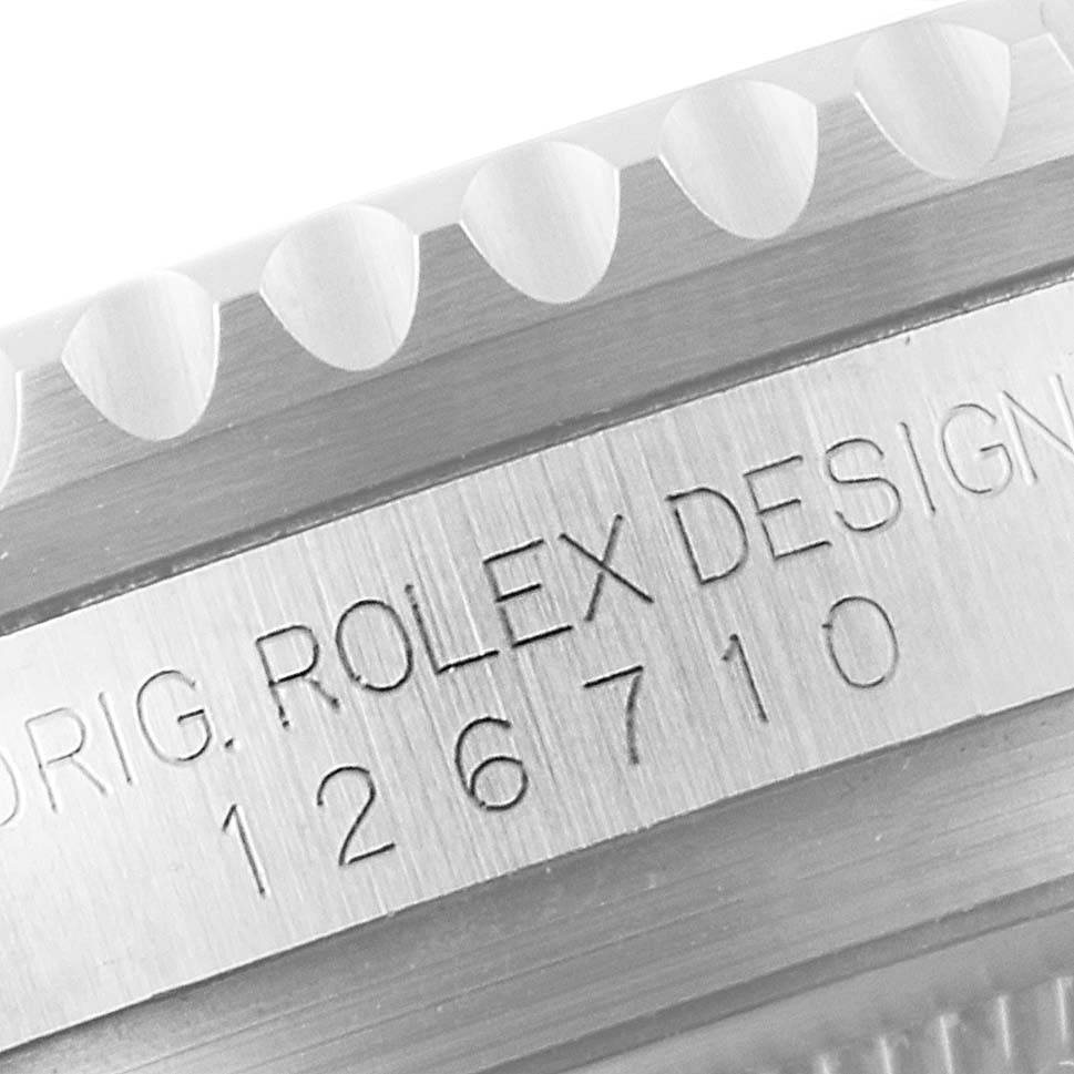 The image shows a close-up of the engraved bezel and model number of the Rolex GMT-Master 126710 Men
s Stainless Steel Black Dial 126710 Men
s Stainless Steel Black Dial watch.