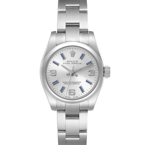 The image shows a front view of a Rolex Oyster Perpetual watch, displaying its silver dial and stainless steel bracelet.