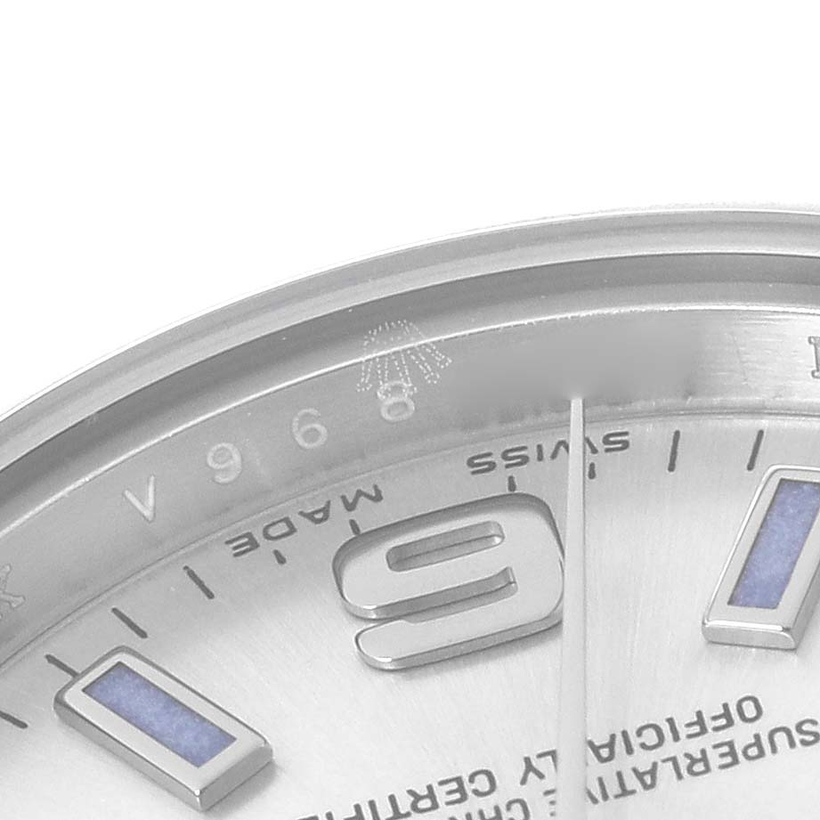 This image displays a close-up of the dial, bezel, and part of the markers of a Rolex Oyster Perpetual 176200 Women's Stainless Steel Silver Dial 176200 Women's Stainless Steel Silver Dial watch.