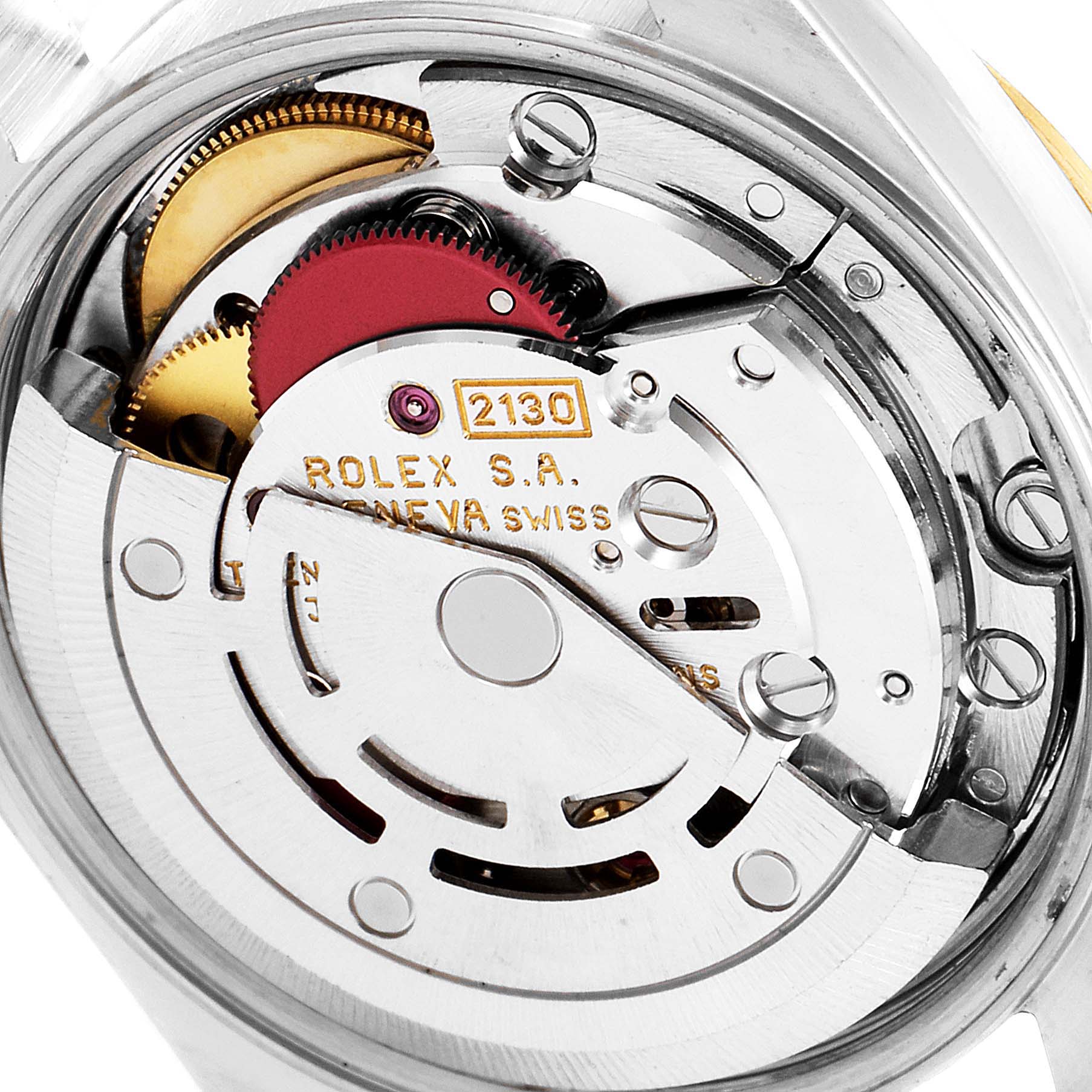 This close-up image shows the movement and internal components of a Rolex Oyster Perpetual 67193 Women's Steel and Gold (two tone) Black Dial 67193 Women's Steel and Gold (two tone) Black Dial watch model.