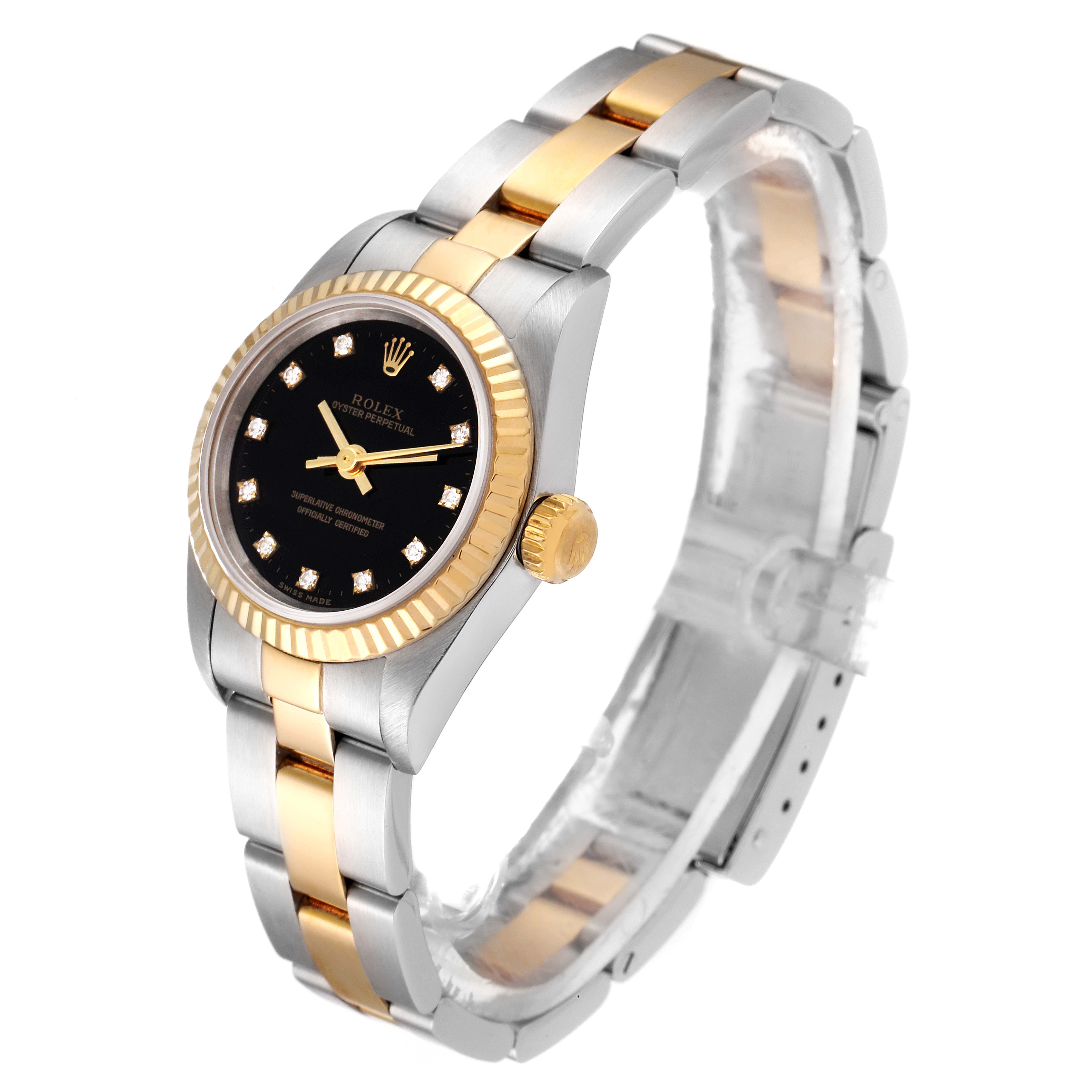 The image shows a side and angled top view of a Rolex Oyster Perpetual 67193 Women's Steel and Gold (two tone) Black Dial 67193 Women's Steel and Gold (two tone) Black Dial watch, highlighting the dial, bezel, and bracelet.