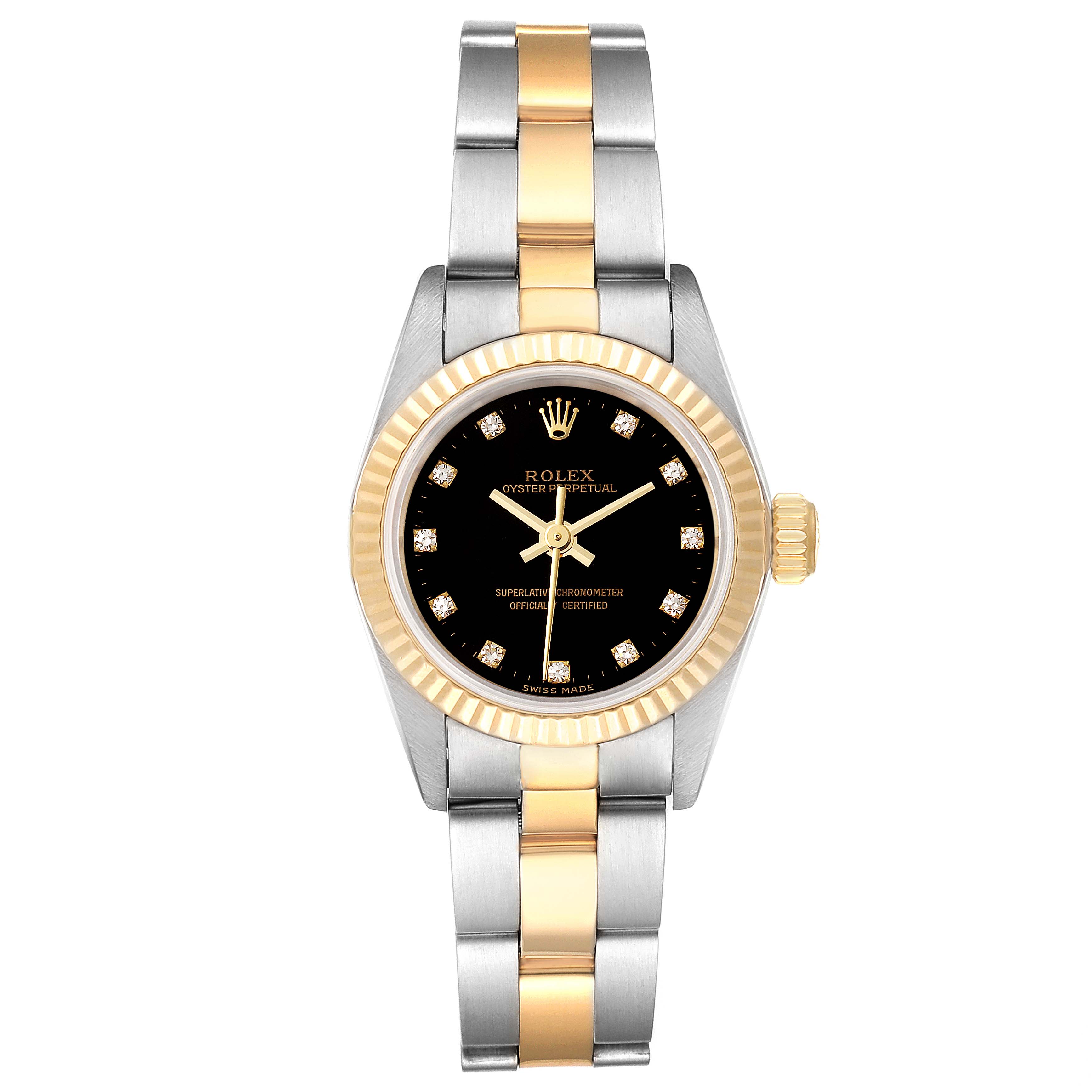 The image shows a Rolex Oyster Perpetual 67193 Women's Steel and Gold (two tone) Black Dial 67193 Women's Steel and Gold (two tone) Black Dial watch from a front angle, displaying its black dial, two-tone bracelet, and fluted bezel.