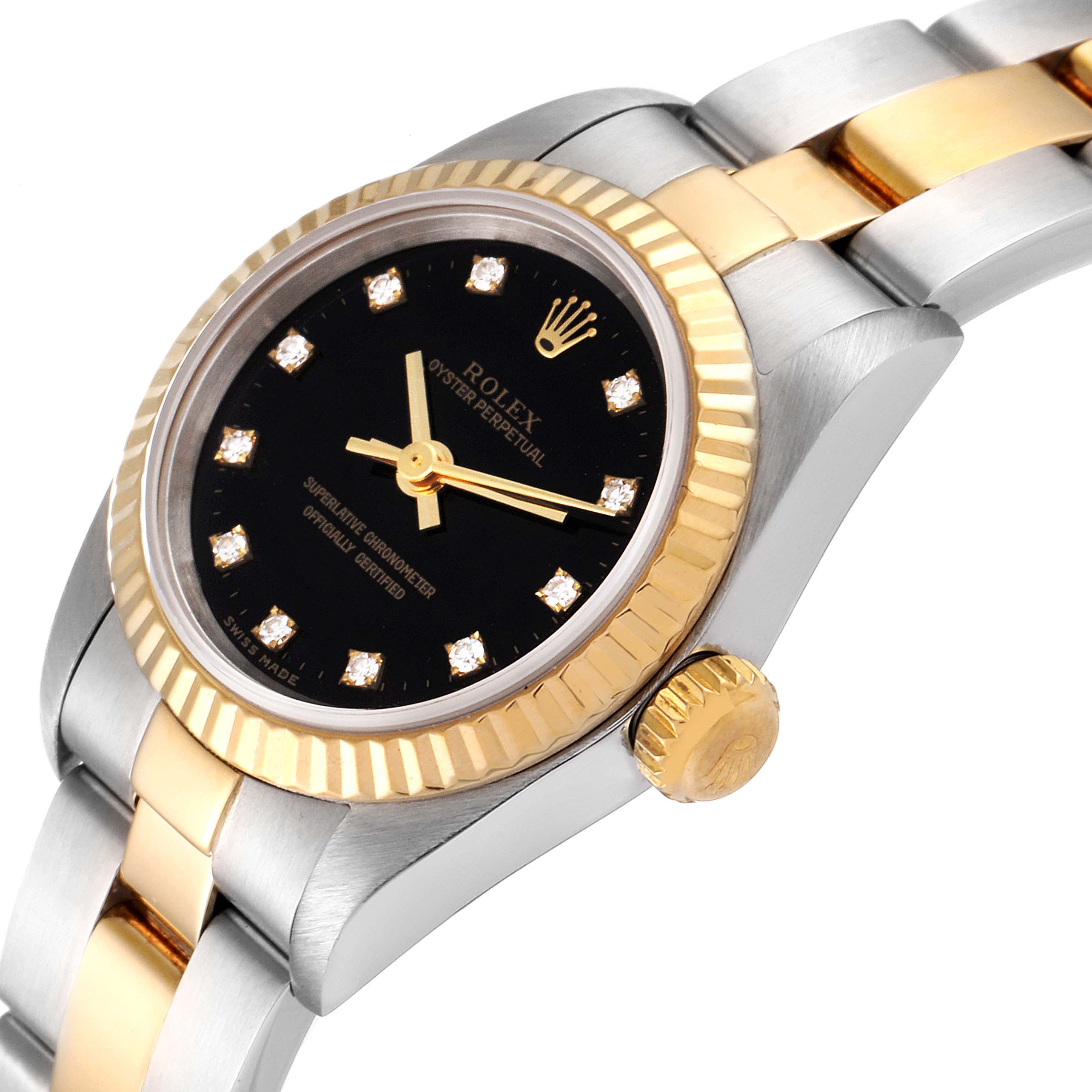 The image shows a Rolex Oyster Perpetual 67193 Women's Steel and Gold (two tone) Black Dial 67193 Women's Steel and Gold (two tone) Black Dial watch at a slight angle, highlighting its dial, bezel, crown, and bracelet.