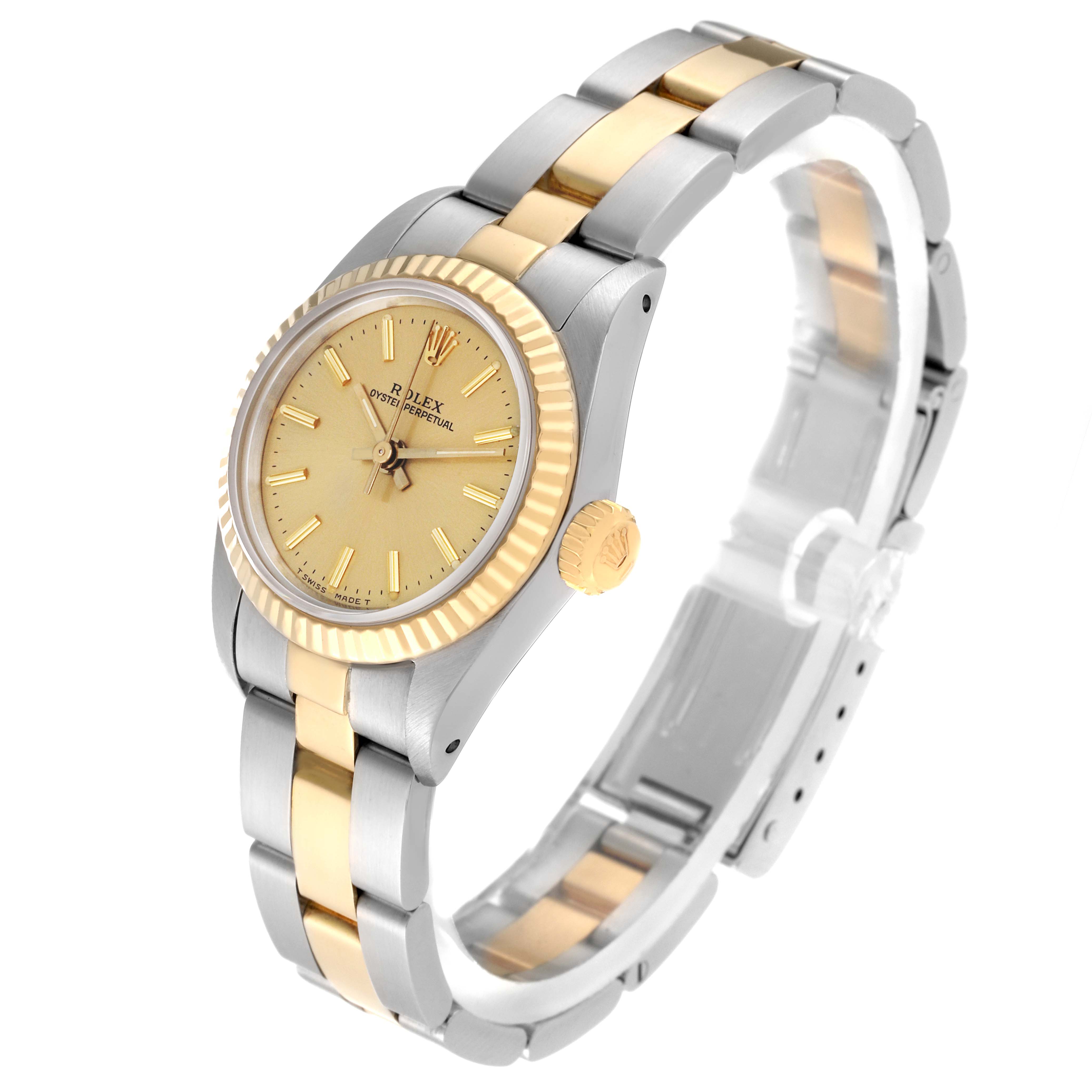The image shows a Rolex Oyster Perpetual 67193 Women's Steel and Gold (two tone) Champagne Dial 67193 Women's Steel and Gold (two tone) Champagne Dial watch at a slight angle, displaying the face, bezel, crown, and two-tone bracelet.